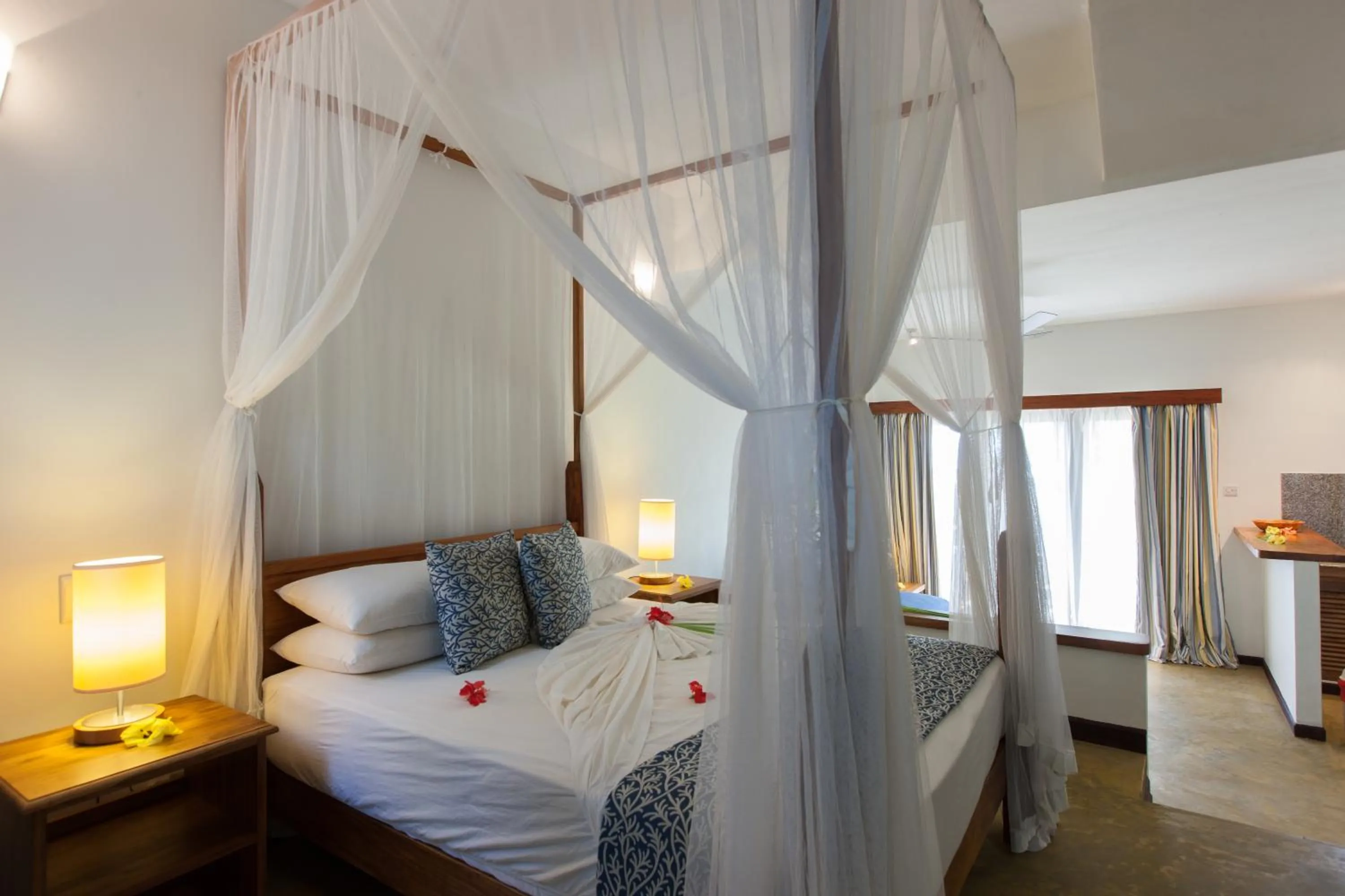 Bed in L'Hirondelle Self Catering Guest House