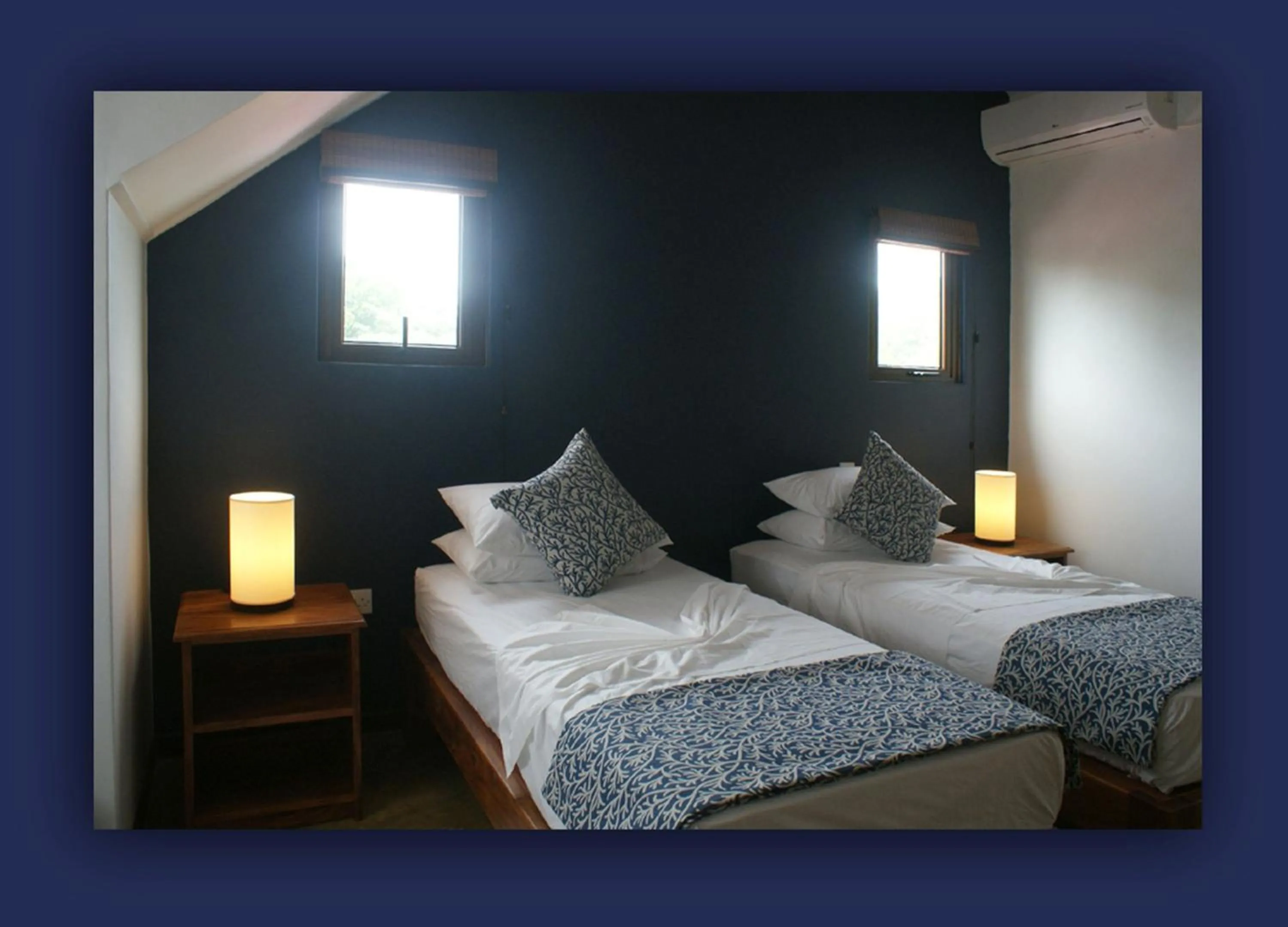 Bed in L'Hirondelle Self Catering Guest House
