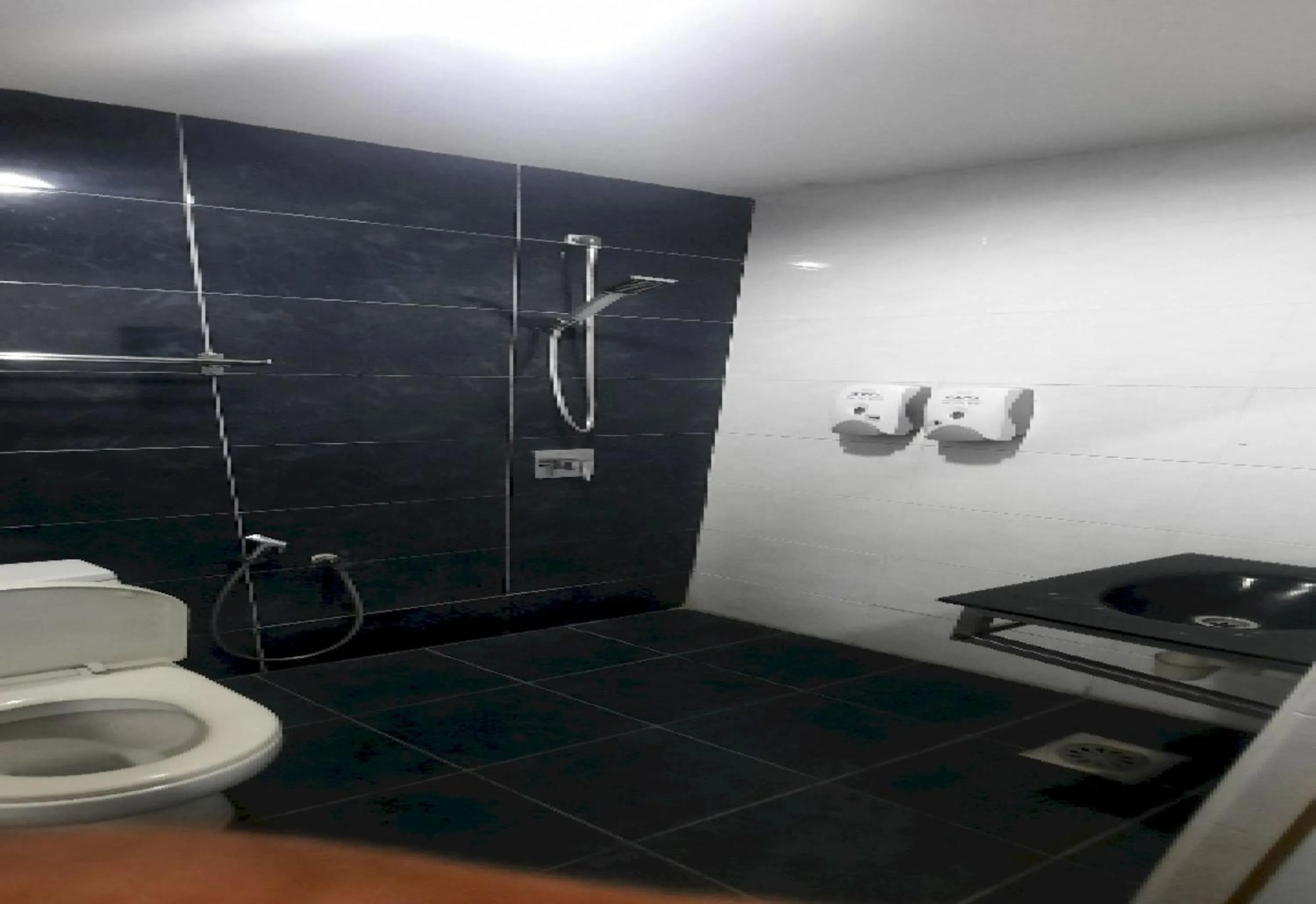 Bathroom in Super OYO 90724 Rg Hotel