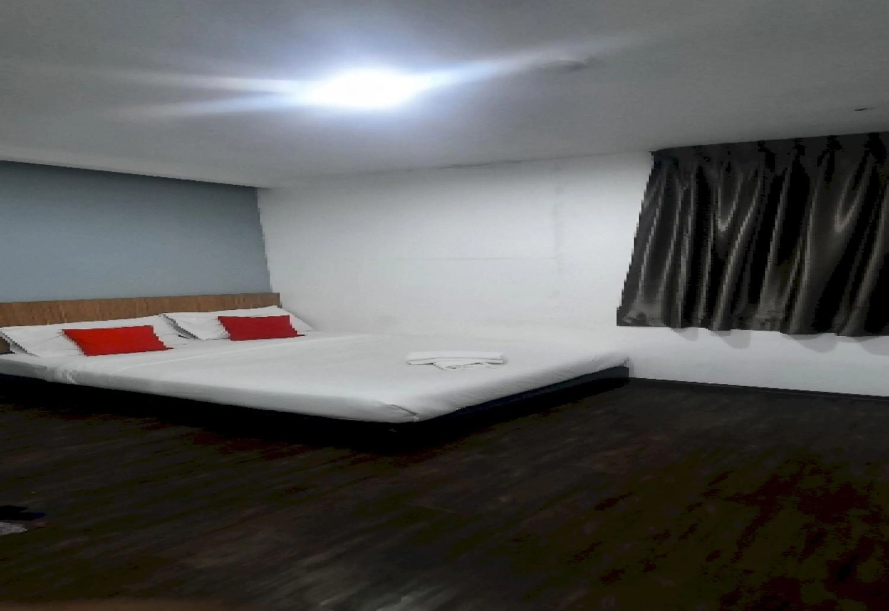 Bedroom in Super OYO 90724 Rg Hotel