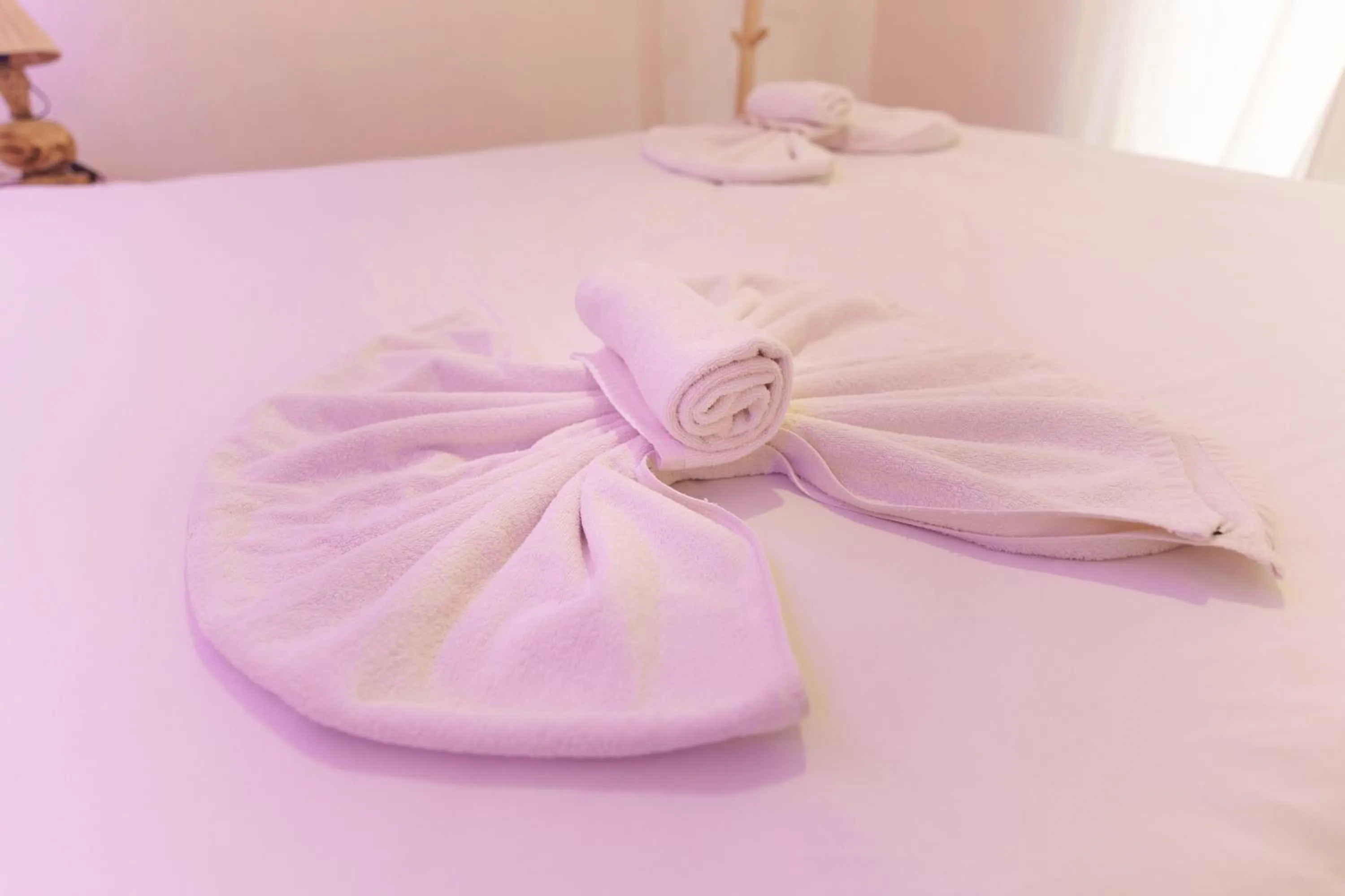 Bed in Whisper Hotel