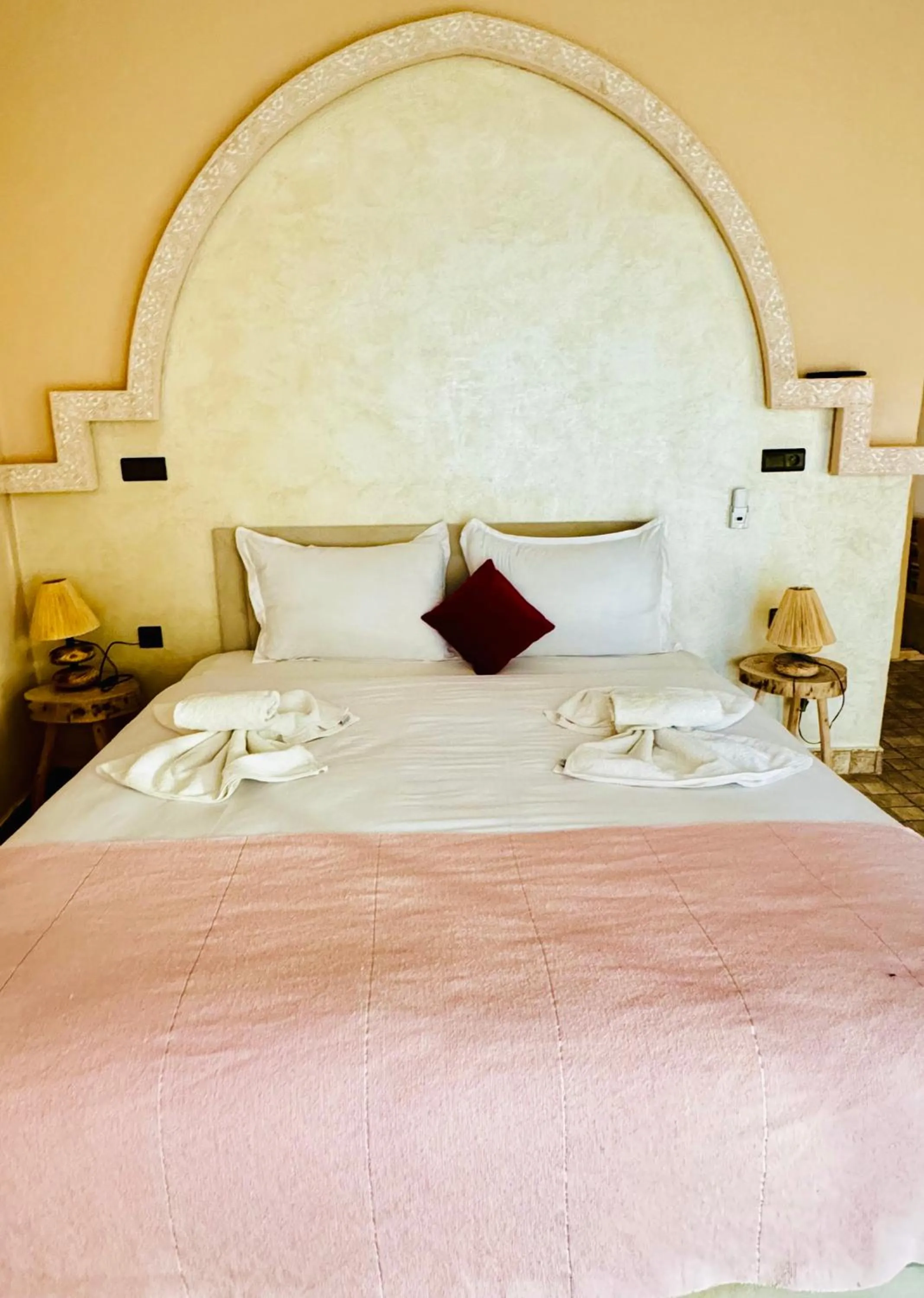 Bed in Whisper Hotel