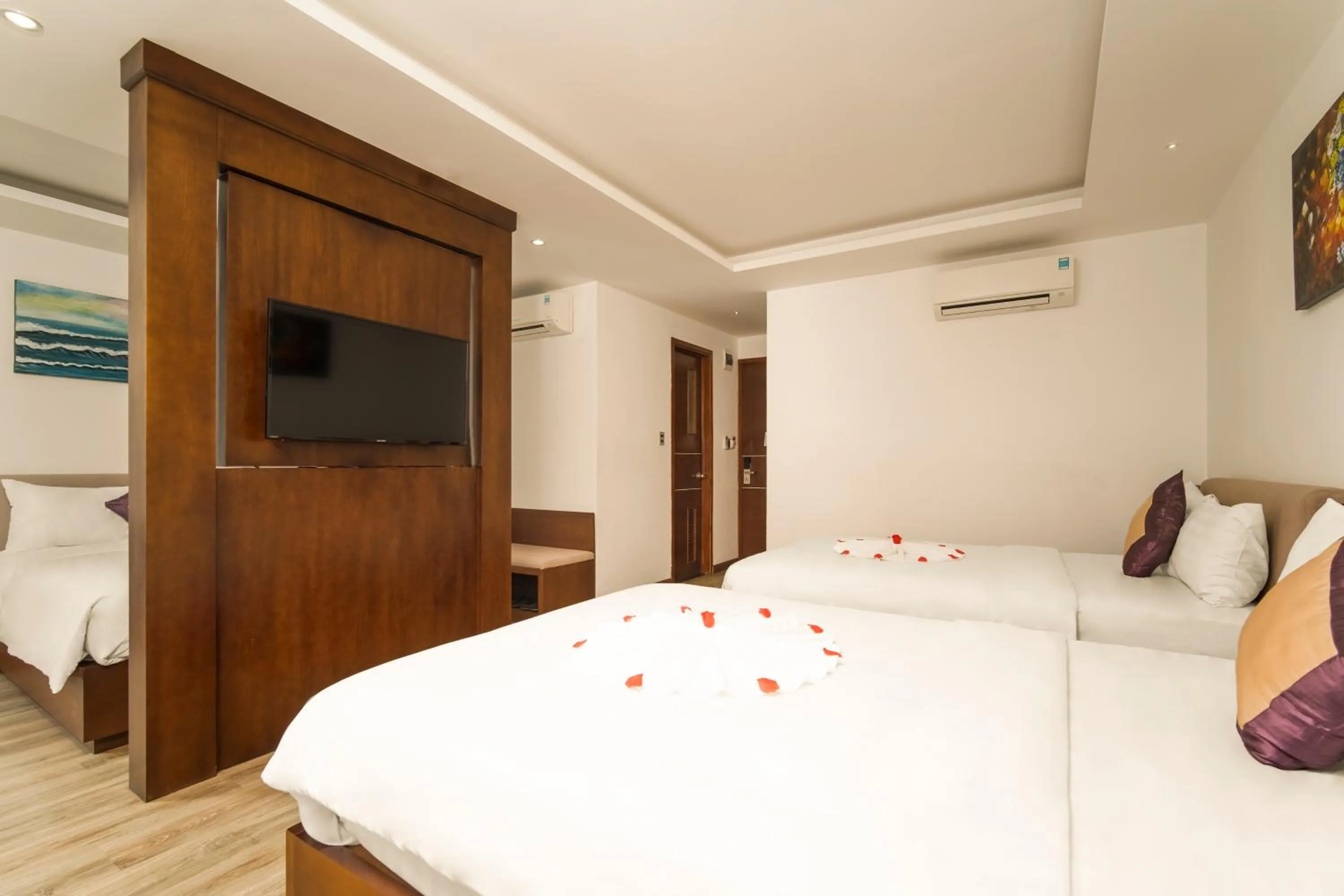 Bed in Golden Sun Apartment by New Sky Travel