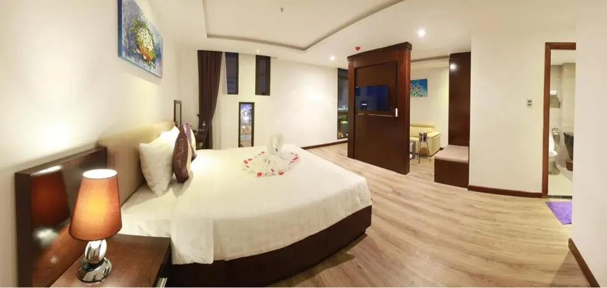 Bed in Golden Sun Apartment by New Sky Travel Bed in Golden Sun Apartment by New Sky Travel