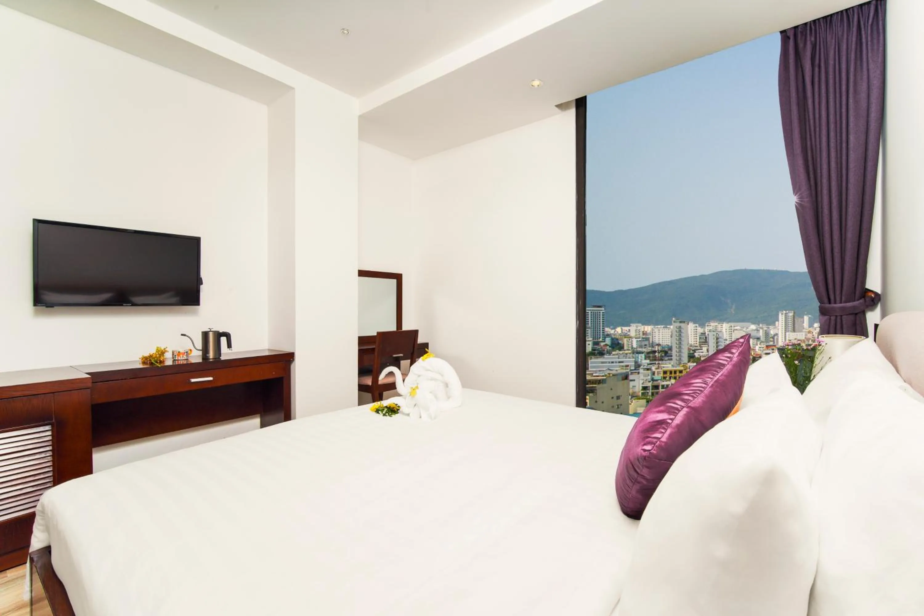 Bed in Golden Sun Apartment by New Sky Travel
