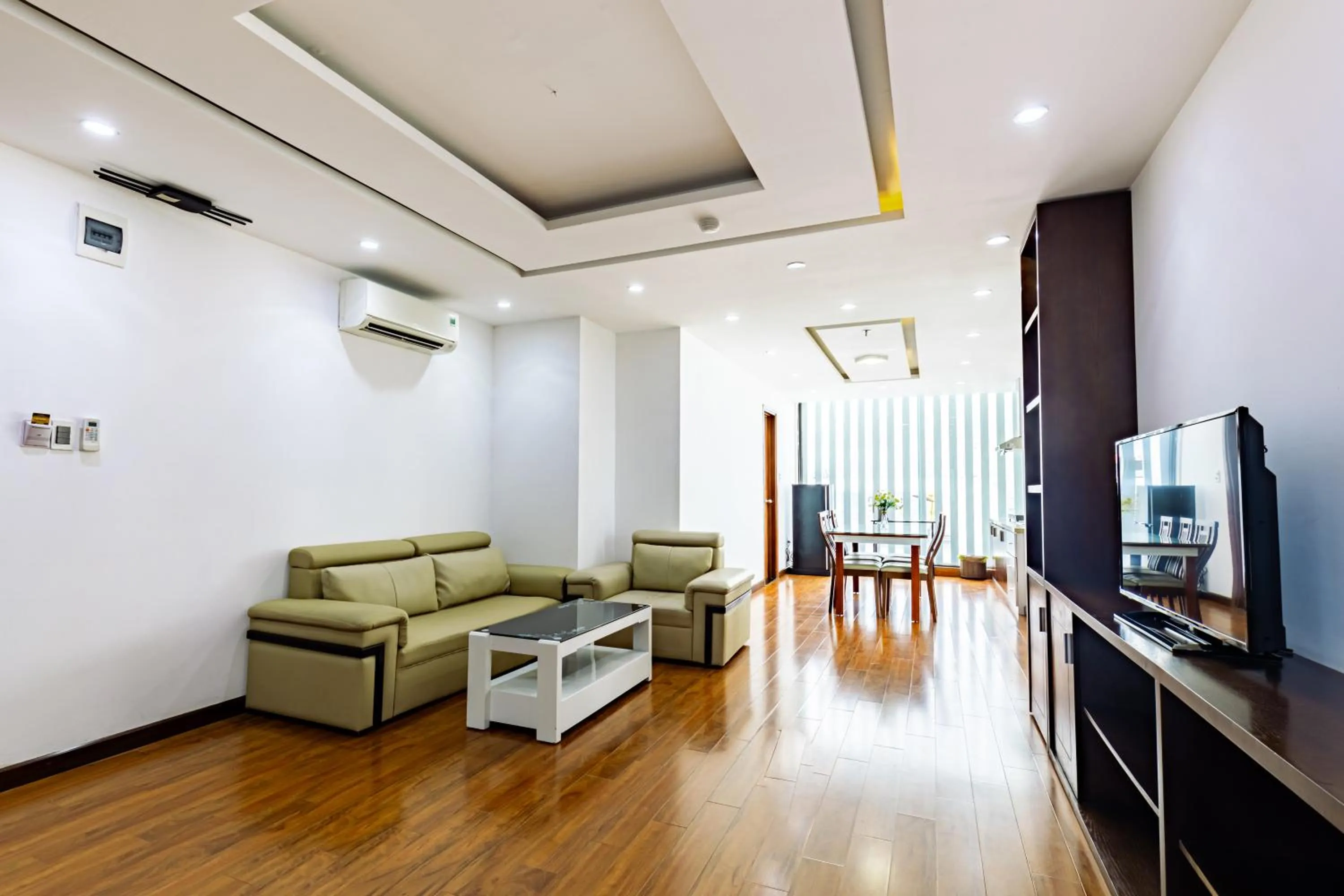 Communal lounge/ TV room in Golden Sun Apartment by New Sky Travel