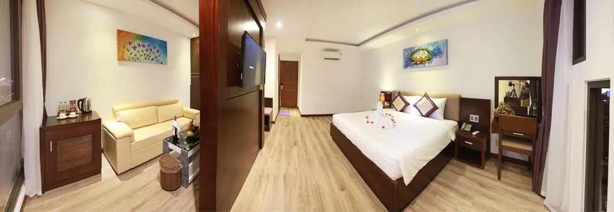 Bed in Golden Sun Apartment by New Sky Travel