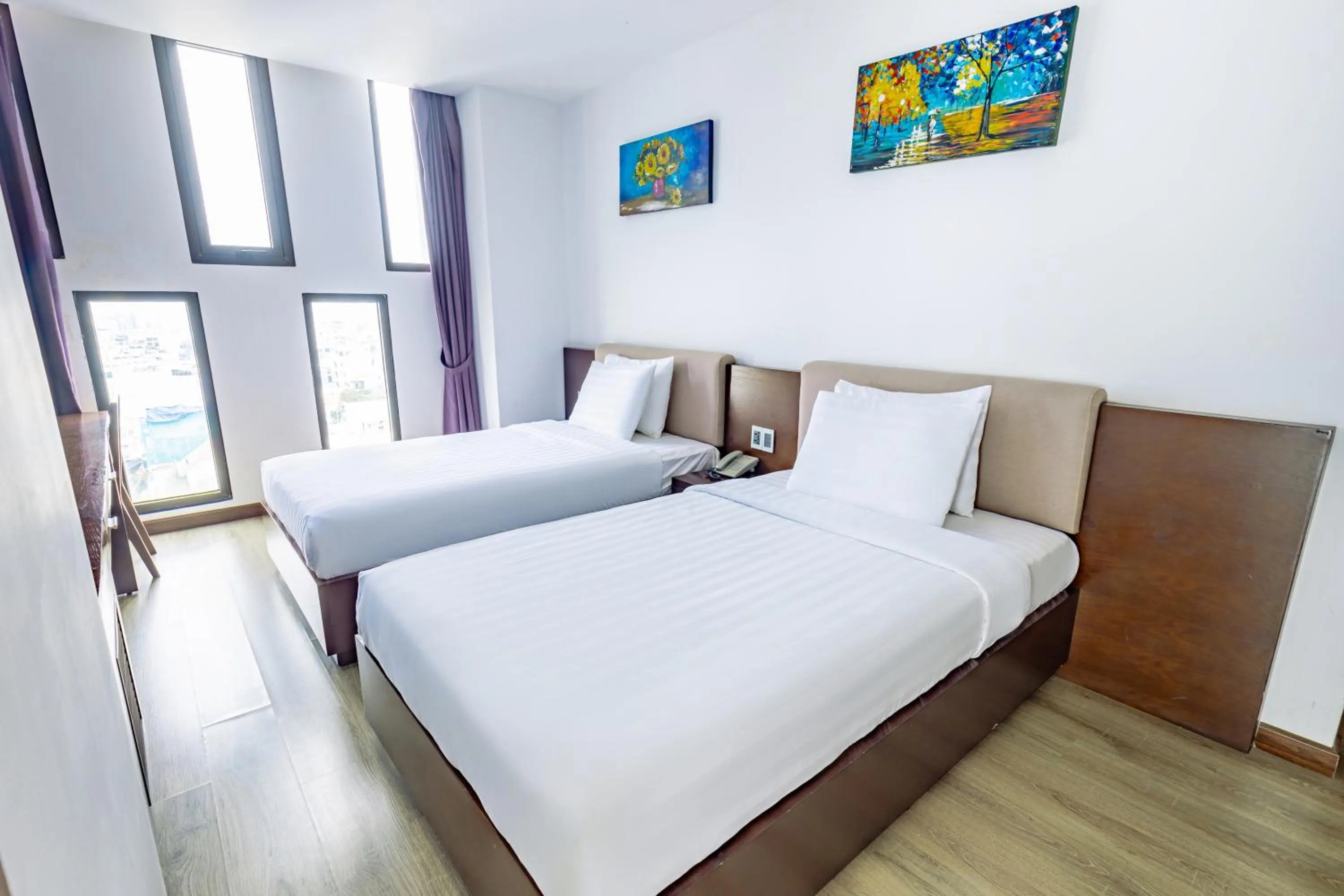 Bed in Golden Sun Apartment by New Sky Travel