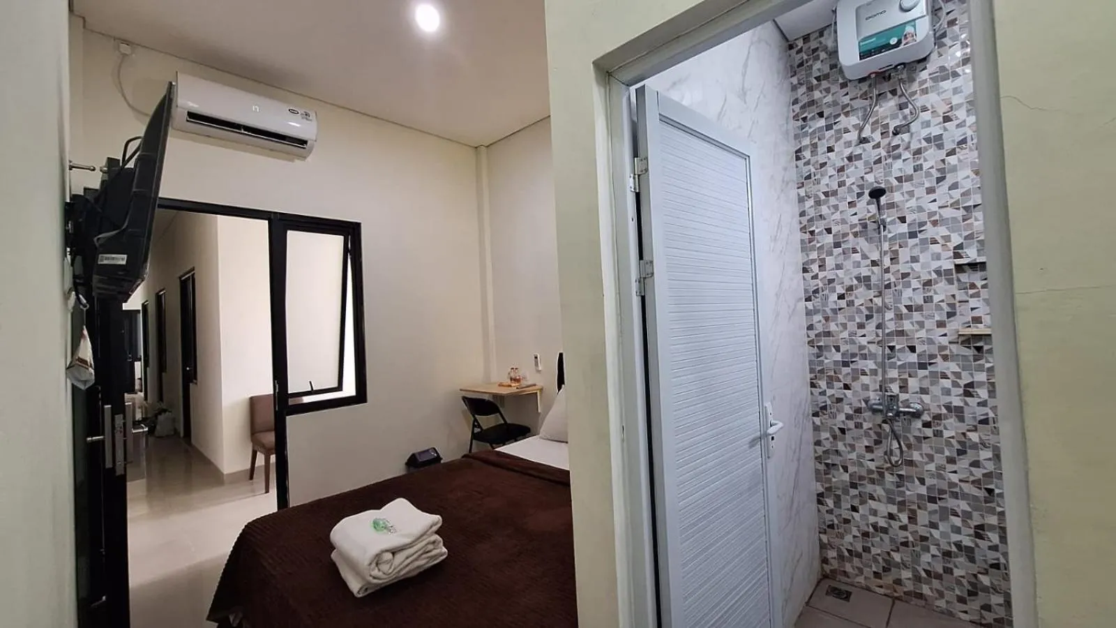 Bed in TRAM - The Seturan Raya Eksklusif Rooms