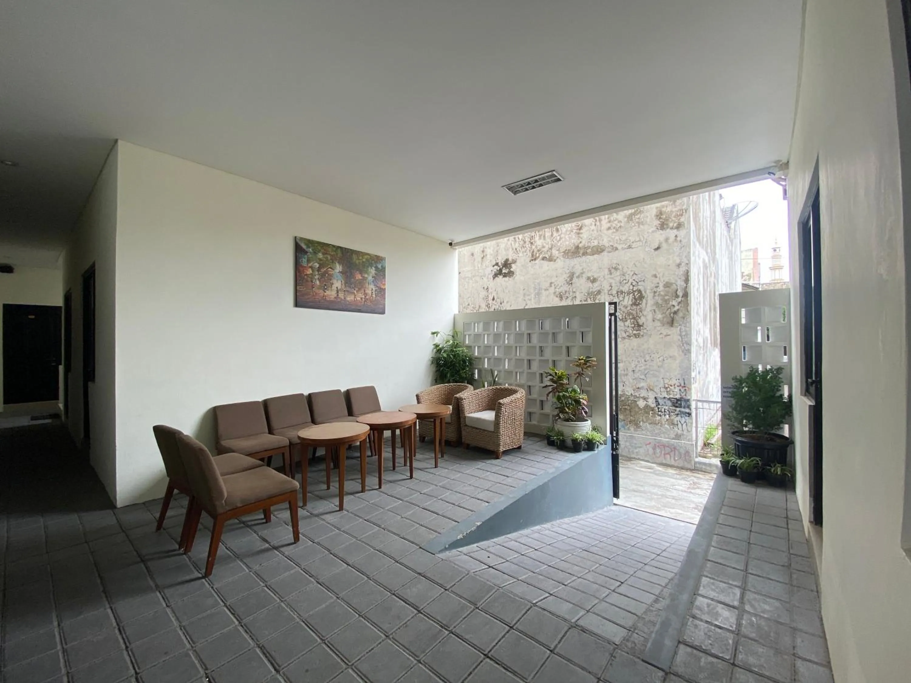 Communal lounge/ TV room in TRAM - The Seturan Raya Eksklusif Rooms