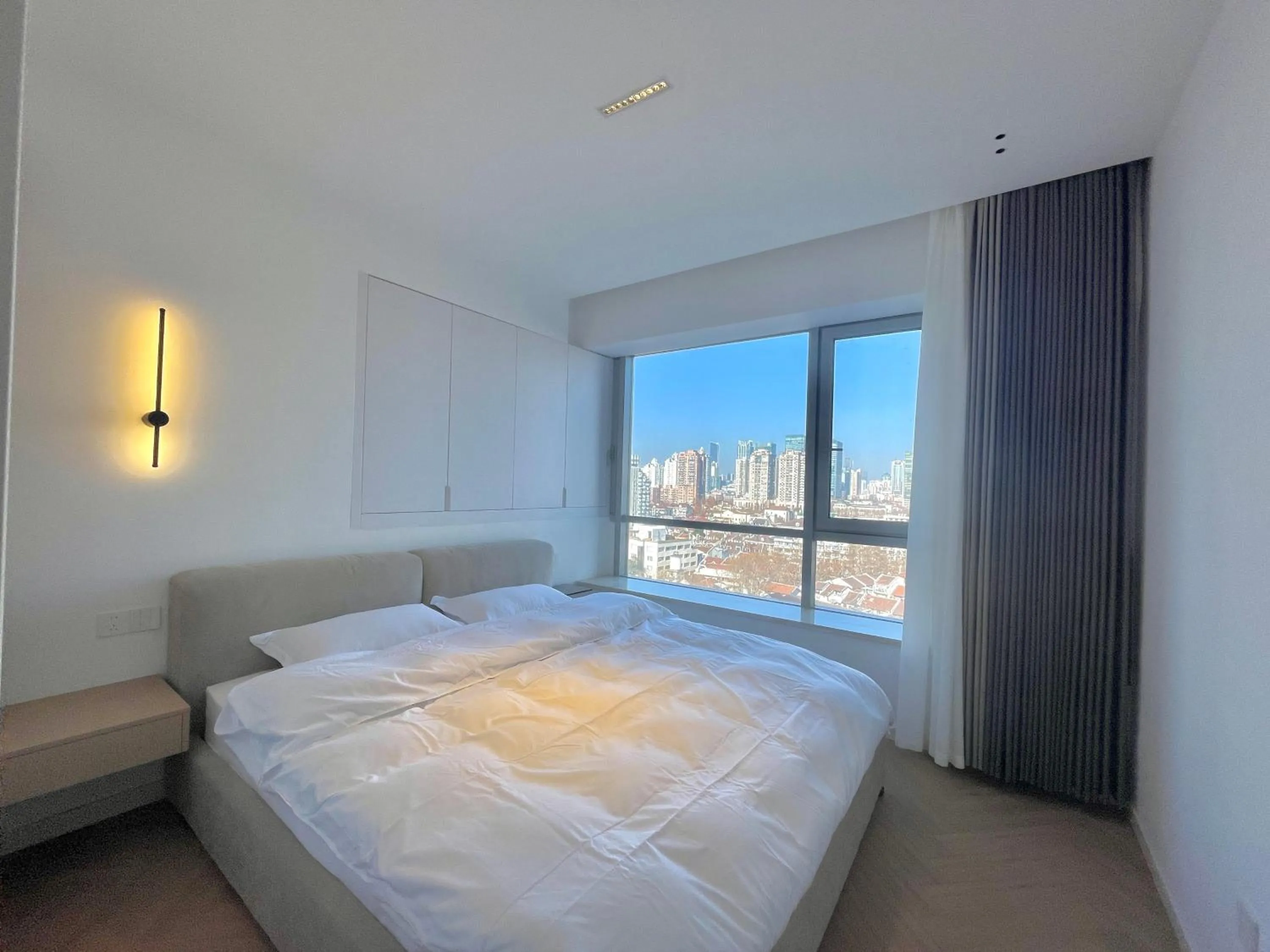 Bed in ZHome-Count luxury apartment