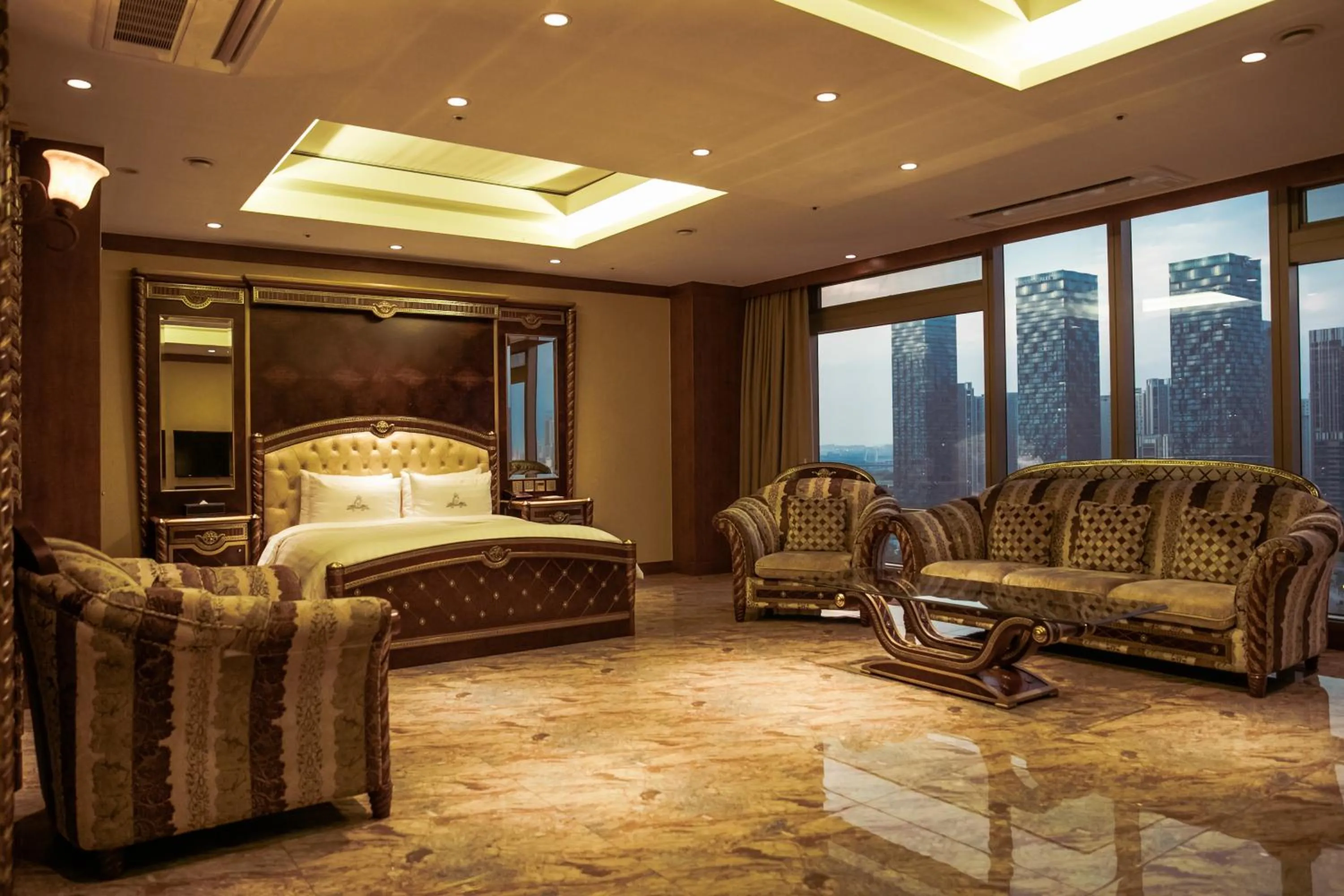 Seating area, Bed in Songdo Central Park Hotel