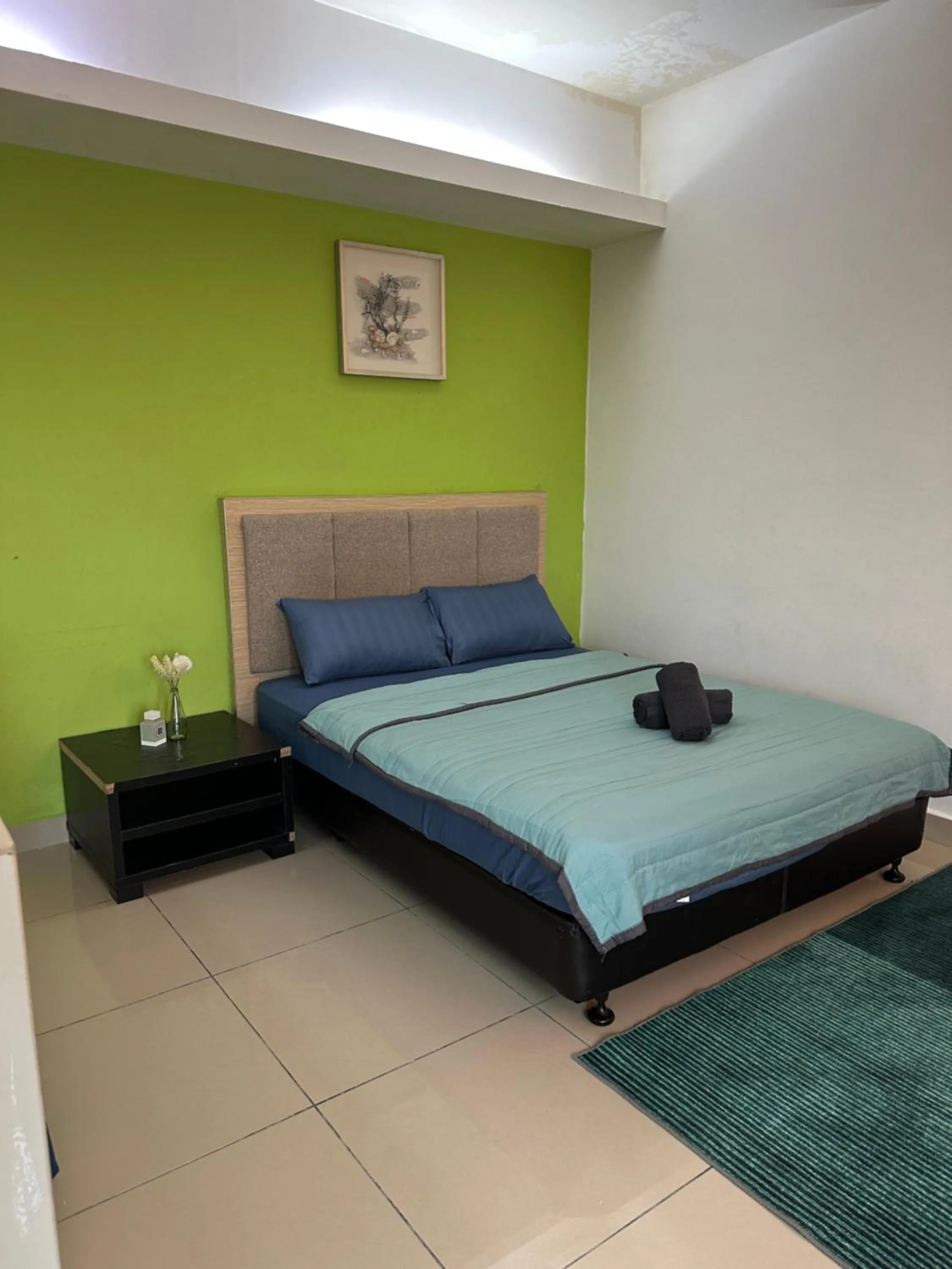 Bed in De Viana Apartment Homestay