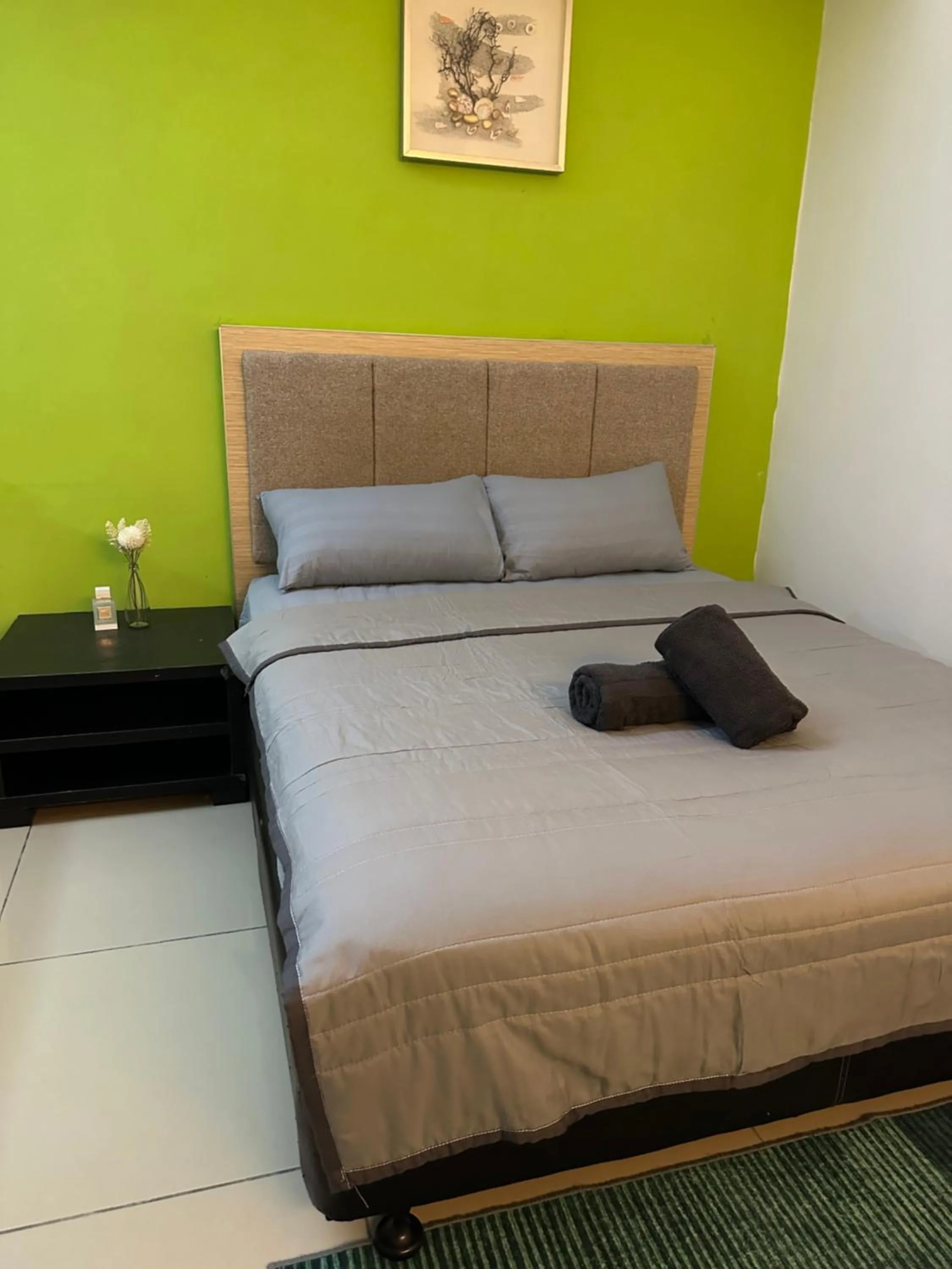 Bed in De Viana Apartment Homestay