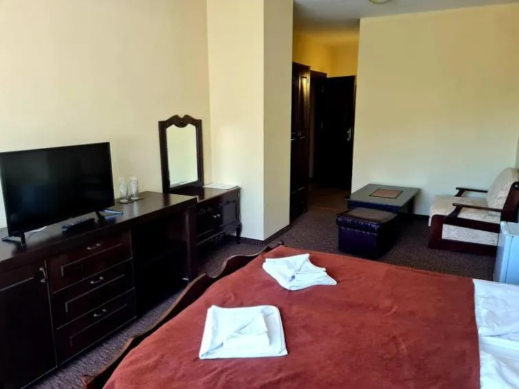 Bed in Family Hotel Bela