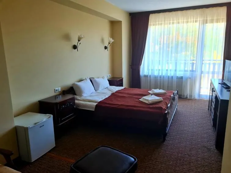 Bed in Family Hotel Bela