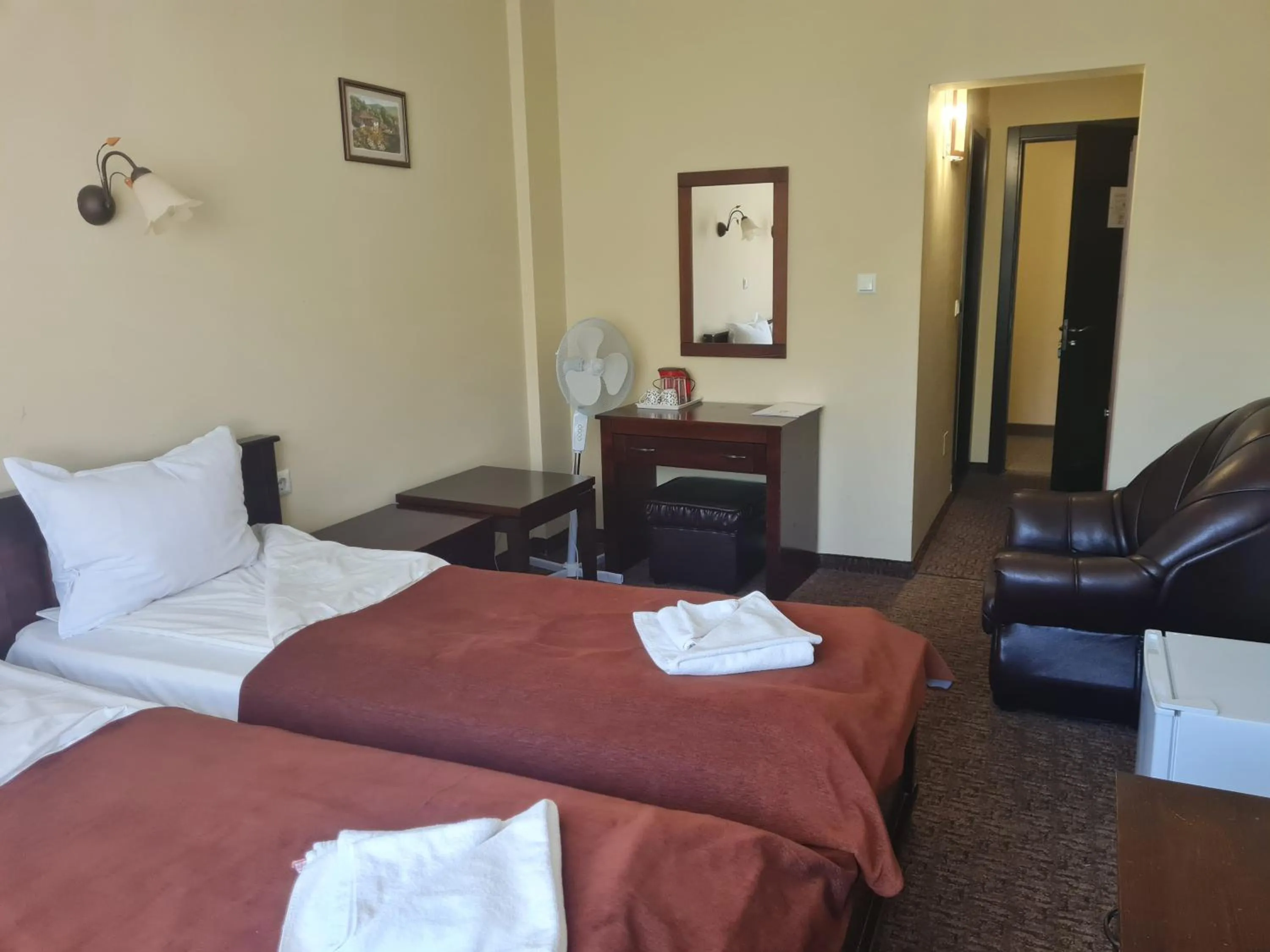 Bed in Family Hotel Bela