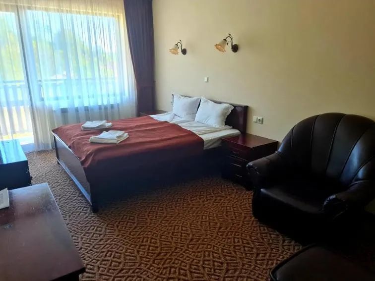 Photo of the whole room, Bed in Family Hotel Bela
