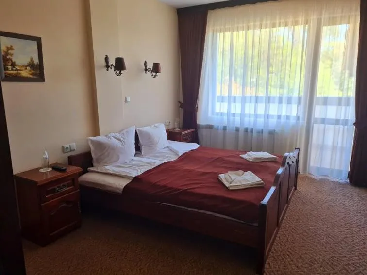 Bed in Family Hotel Bela