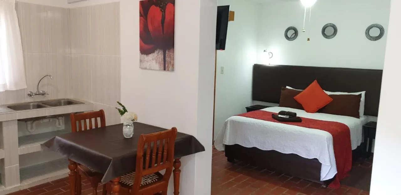 Bed in Woodpecker Inn