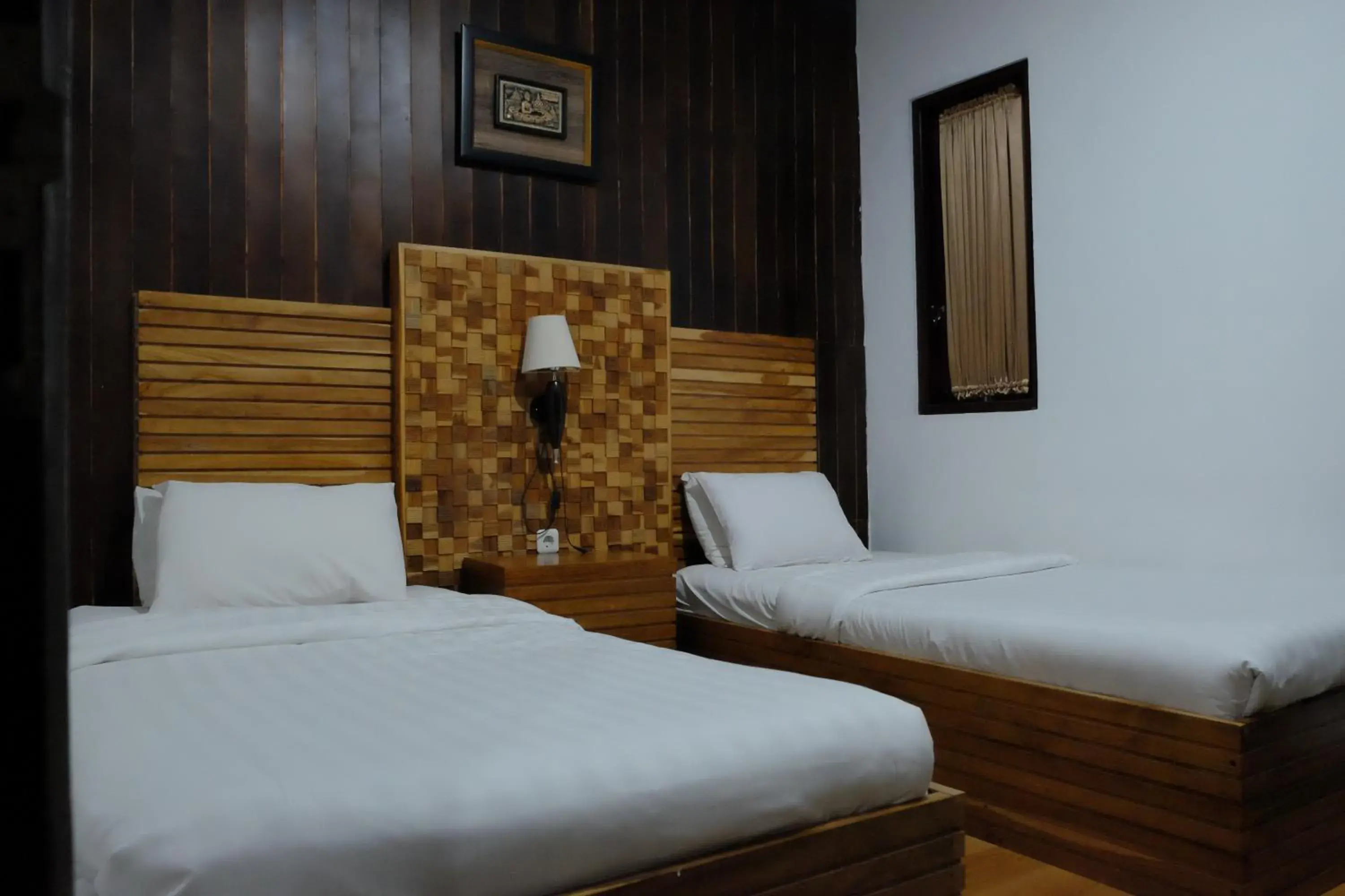 Bed in Puri Minggiran Guest House Bed in Puri Minggiran Guest House