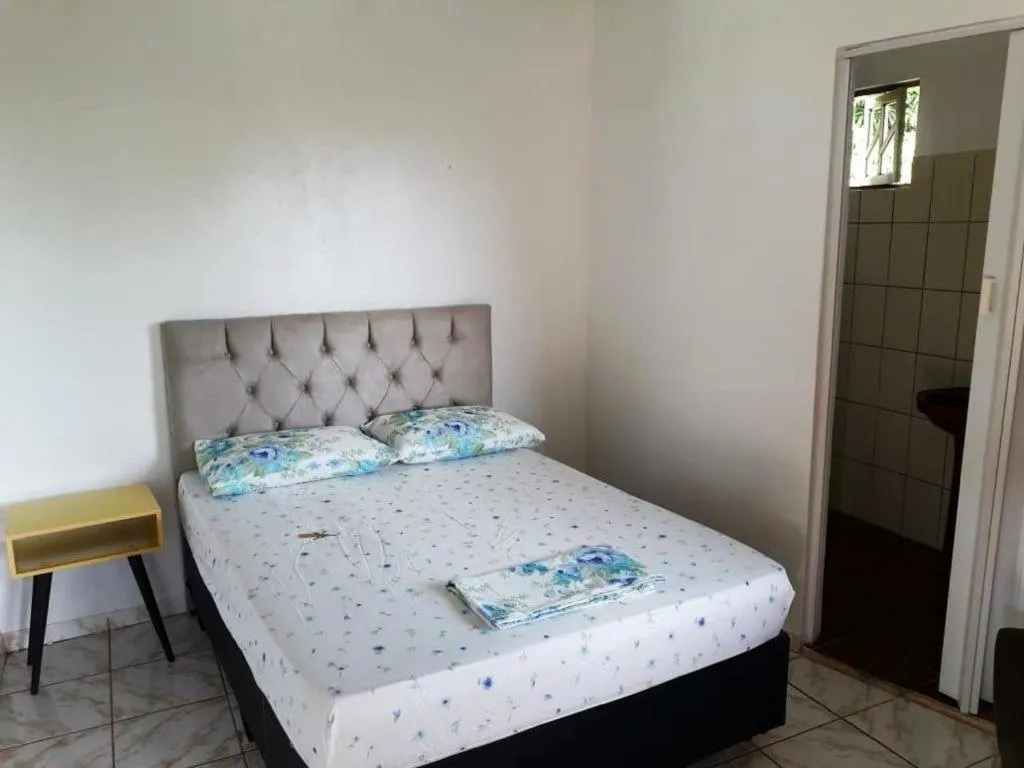 Bed in Pousada Caminho do Ribeirão