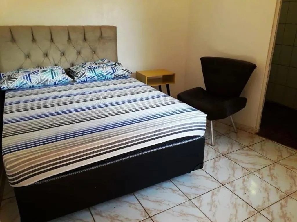 Bed in Pousada Caminho do Ribeirão