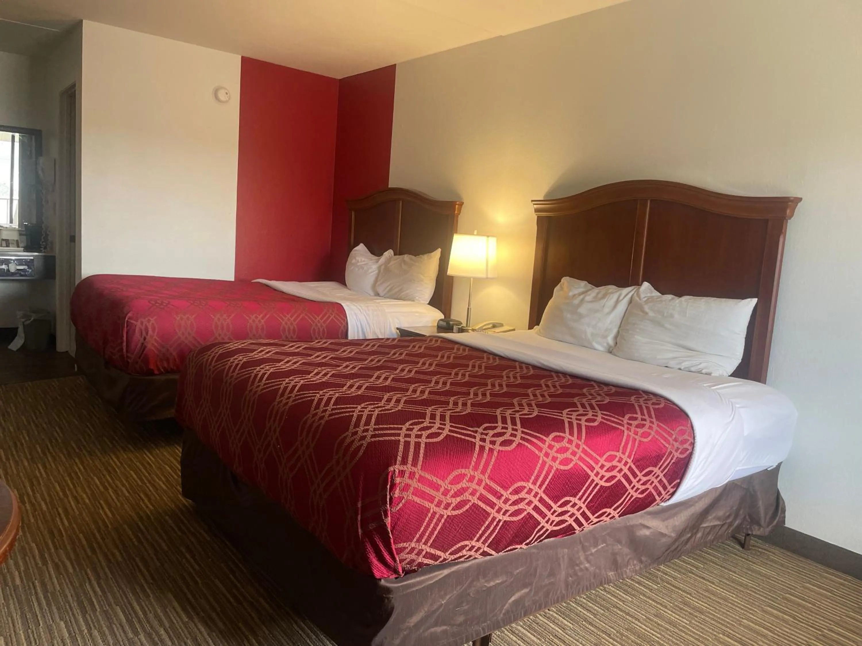 Bedroom in Ramada by Wyndham Branson Theatre District