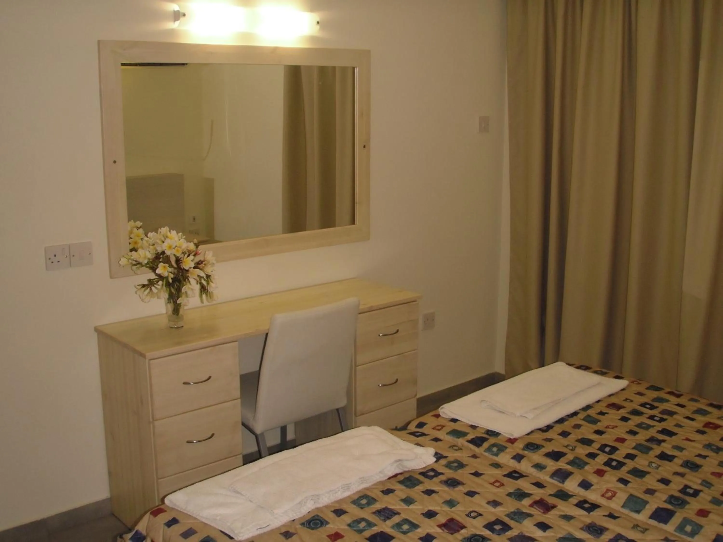 Bed in Eligonia Hotel Apartments