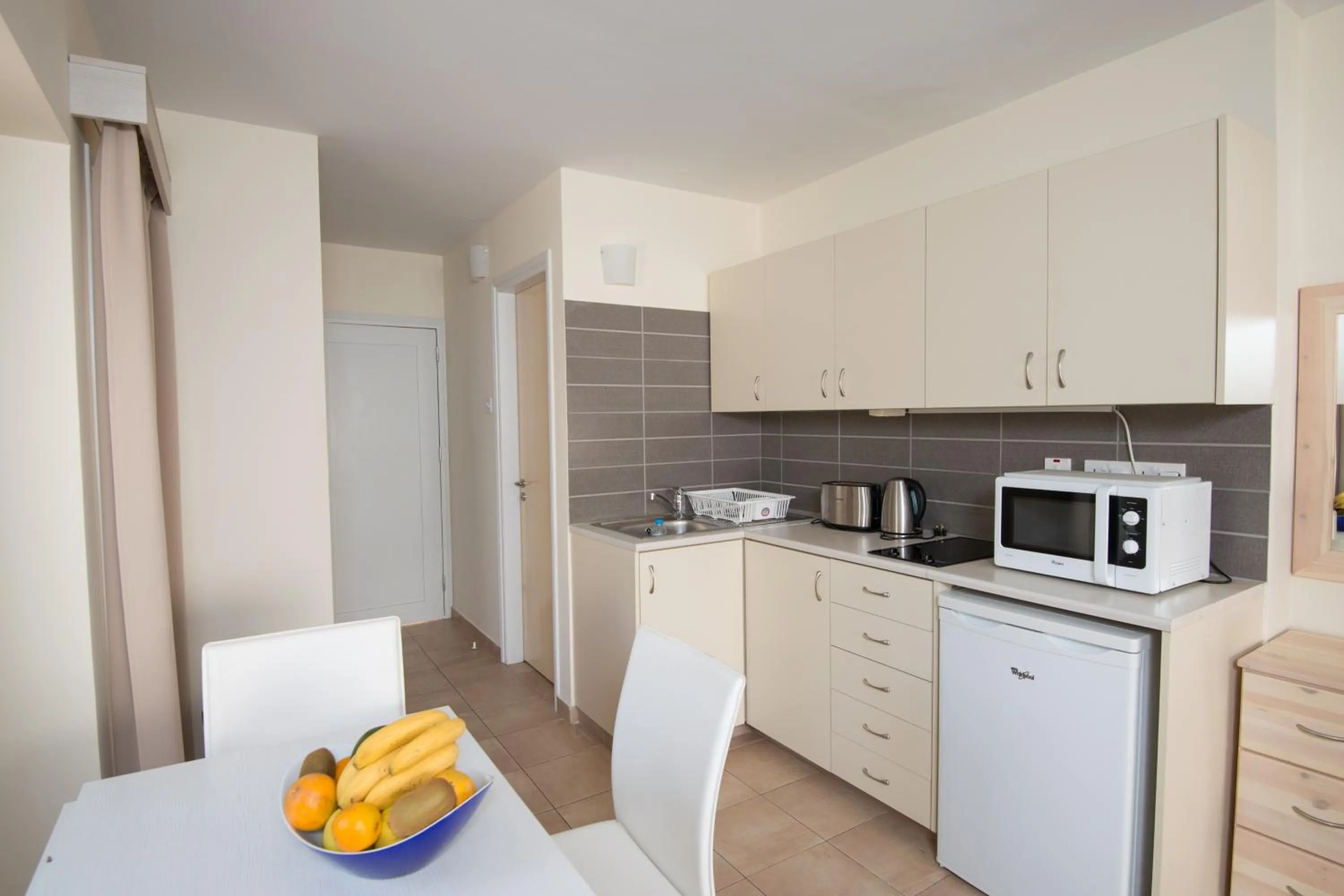 Kitchen or kitchenette in Eligonia Hotel Apartments