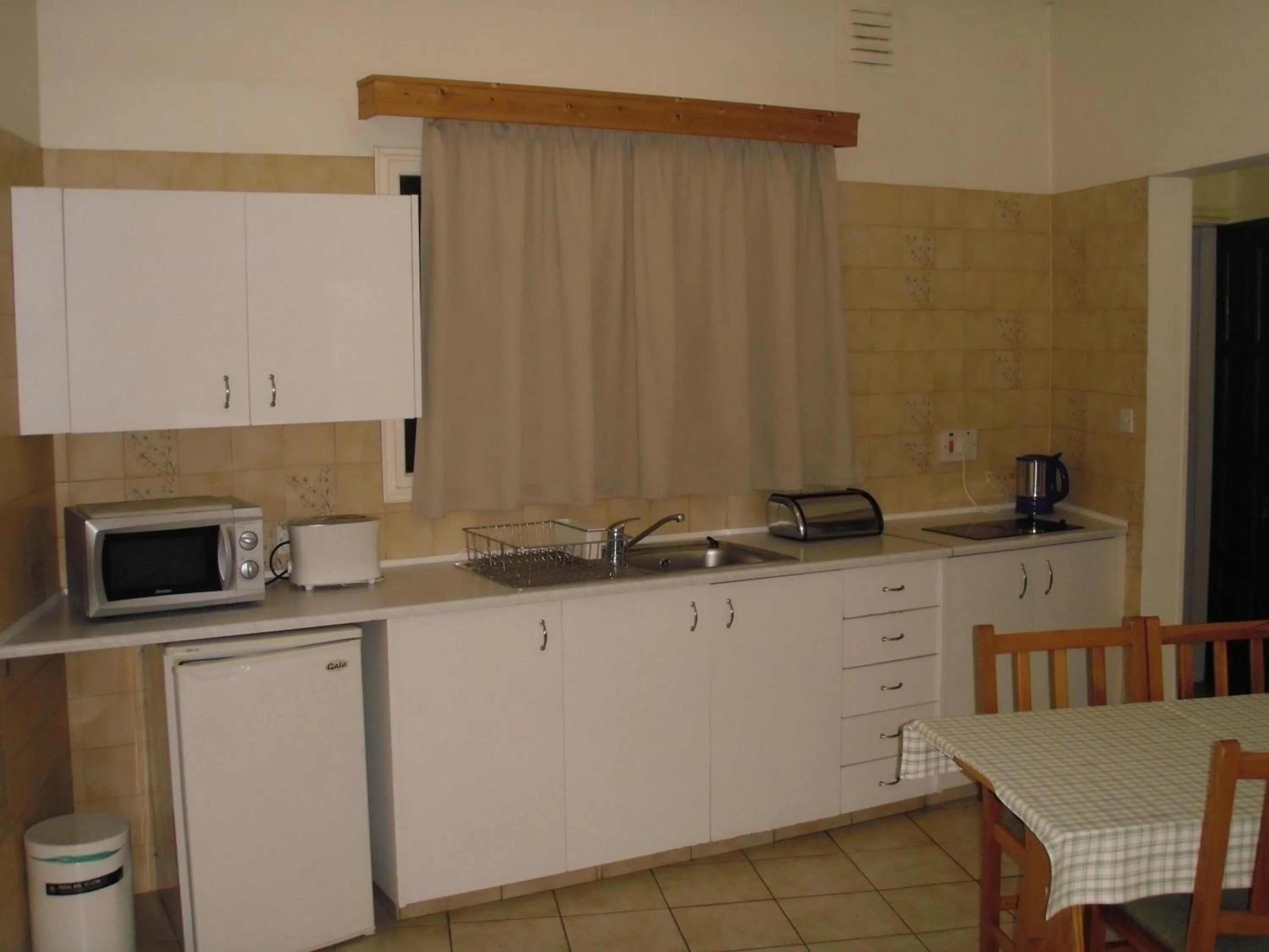 Kitchen or kitchenette in Eligonia Hotel Apartments