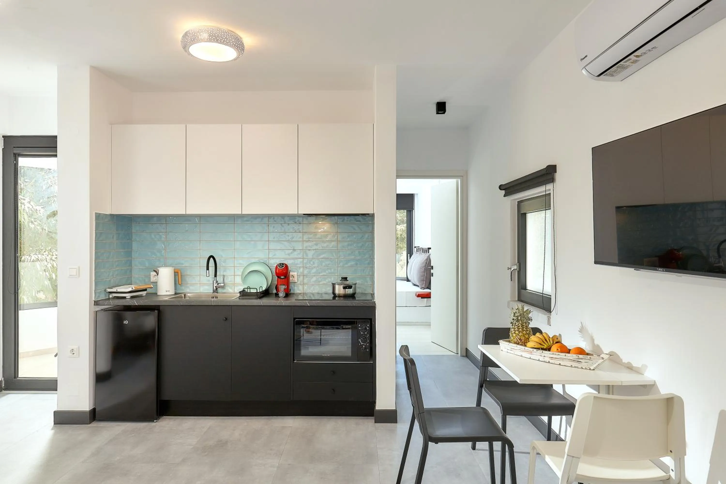 Kitchen or kitchenette in MichELe Luxury apartments by Smaris Collection