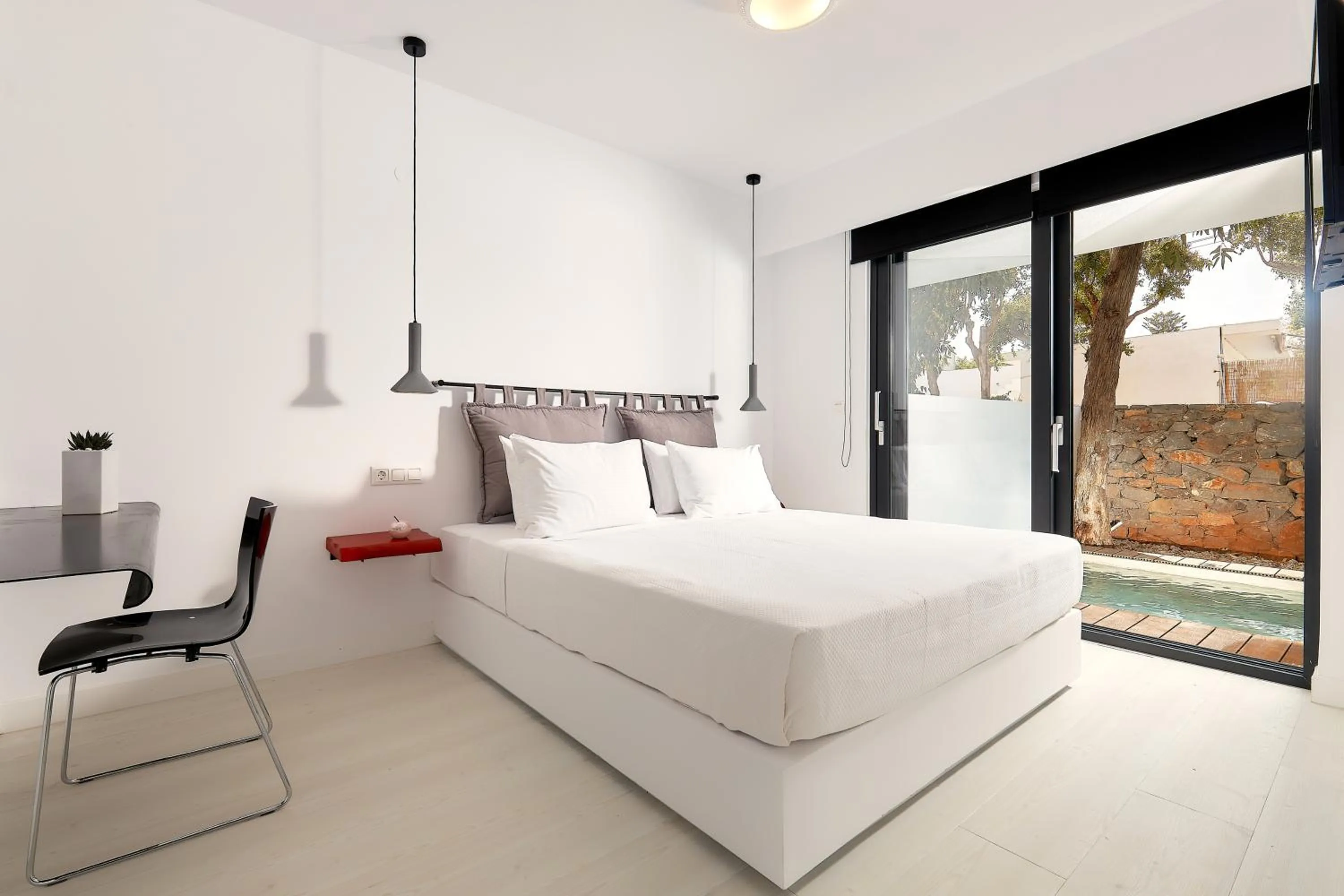 Bed in MichELe Luxury apartments by Smaris Collection