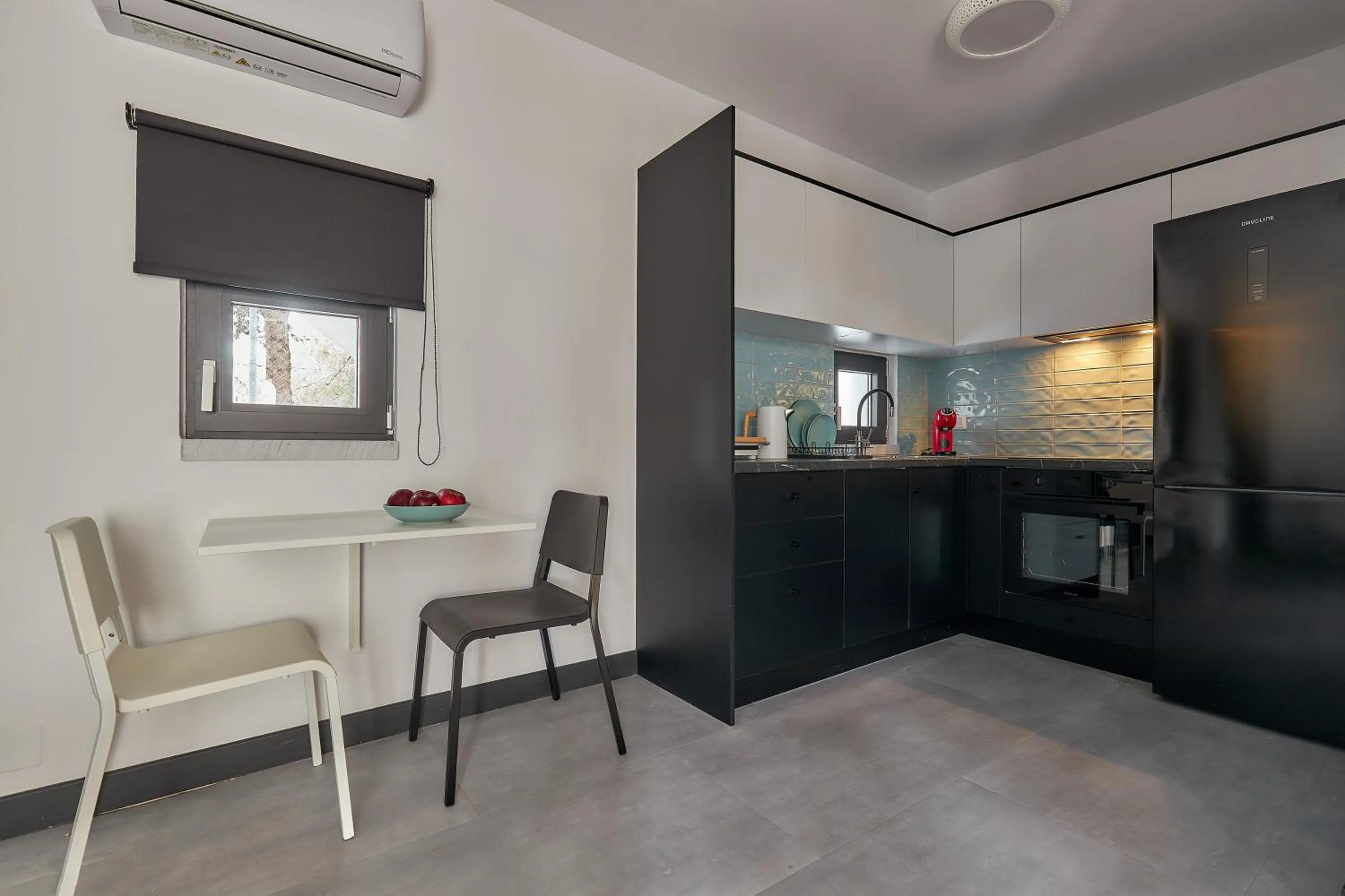 Dining area in MichELe Luxury apartments by Smaris Collection