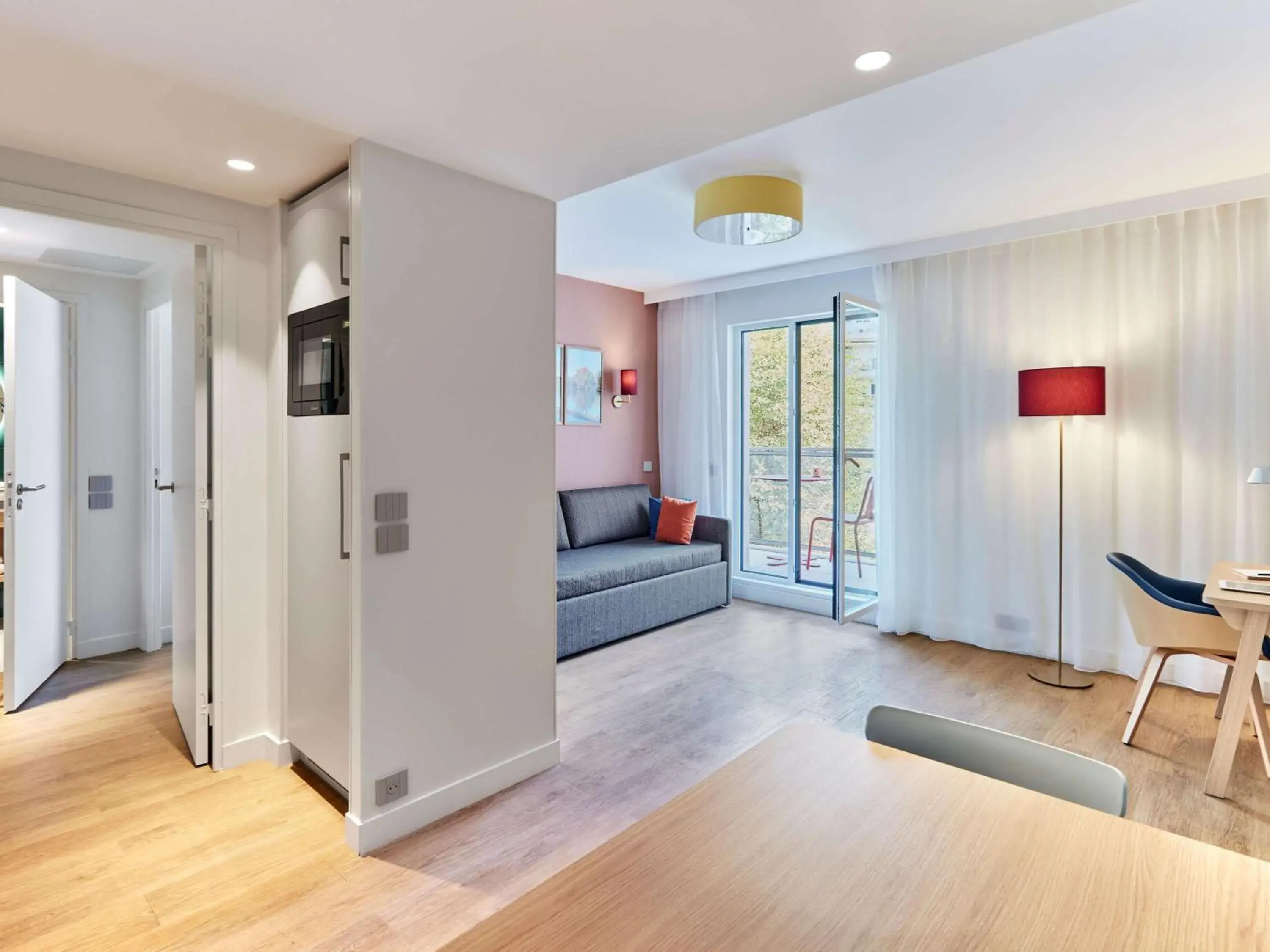 Communal lounge/ TV room in Aparthotel Adagio Paris Boulogne Communal lounge/ TV room in Aparthotel Adagio Paris Boulogne