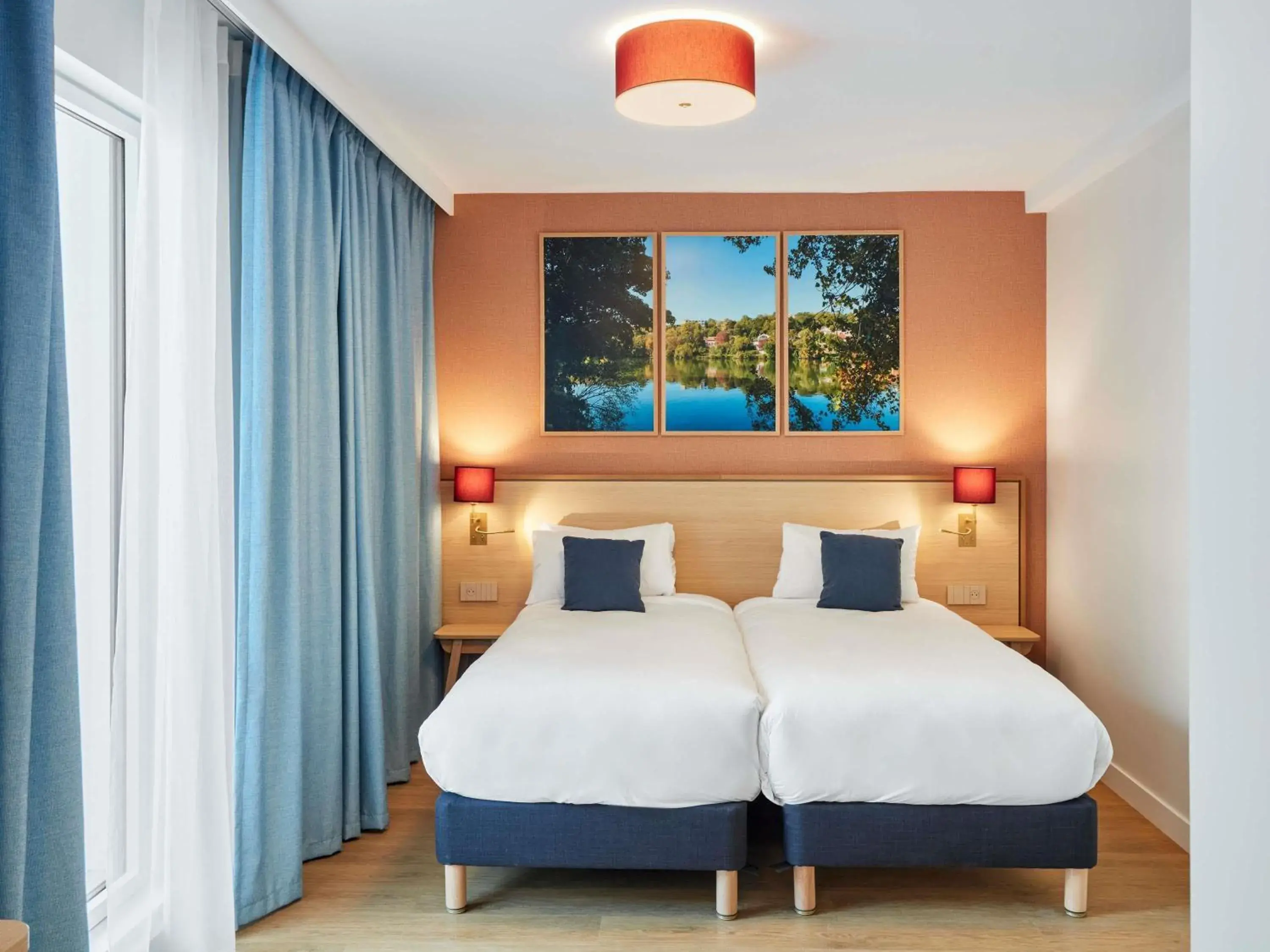 Bed in Aparthotel Adagio Paris Boulogne Bed in Aparthotel Adagio Paris Boulogne