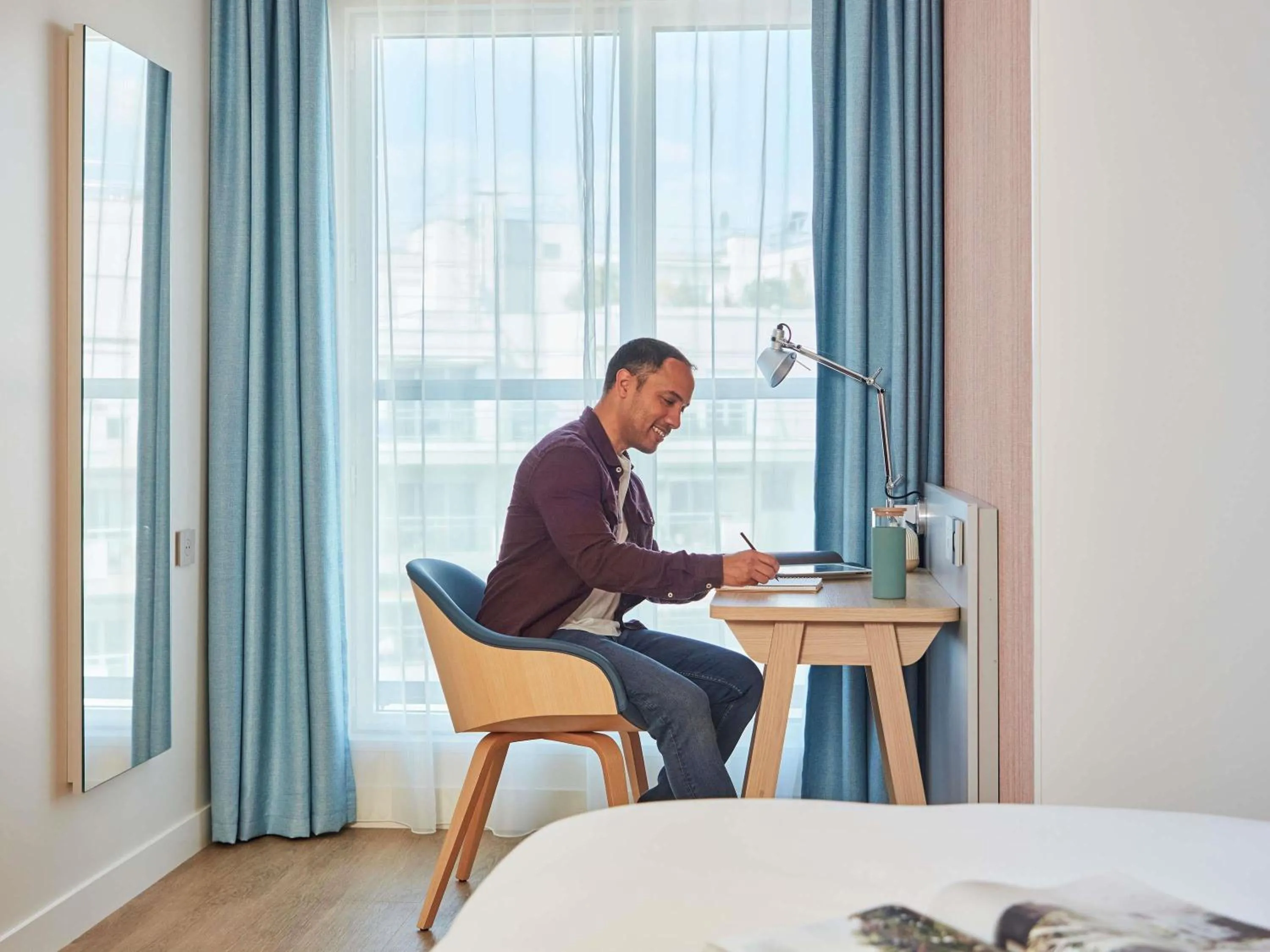 Bedroom in Aparthotel Adagio Paris Boulogne