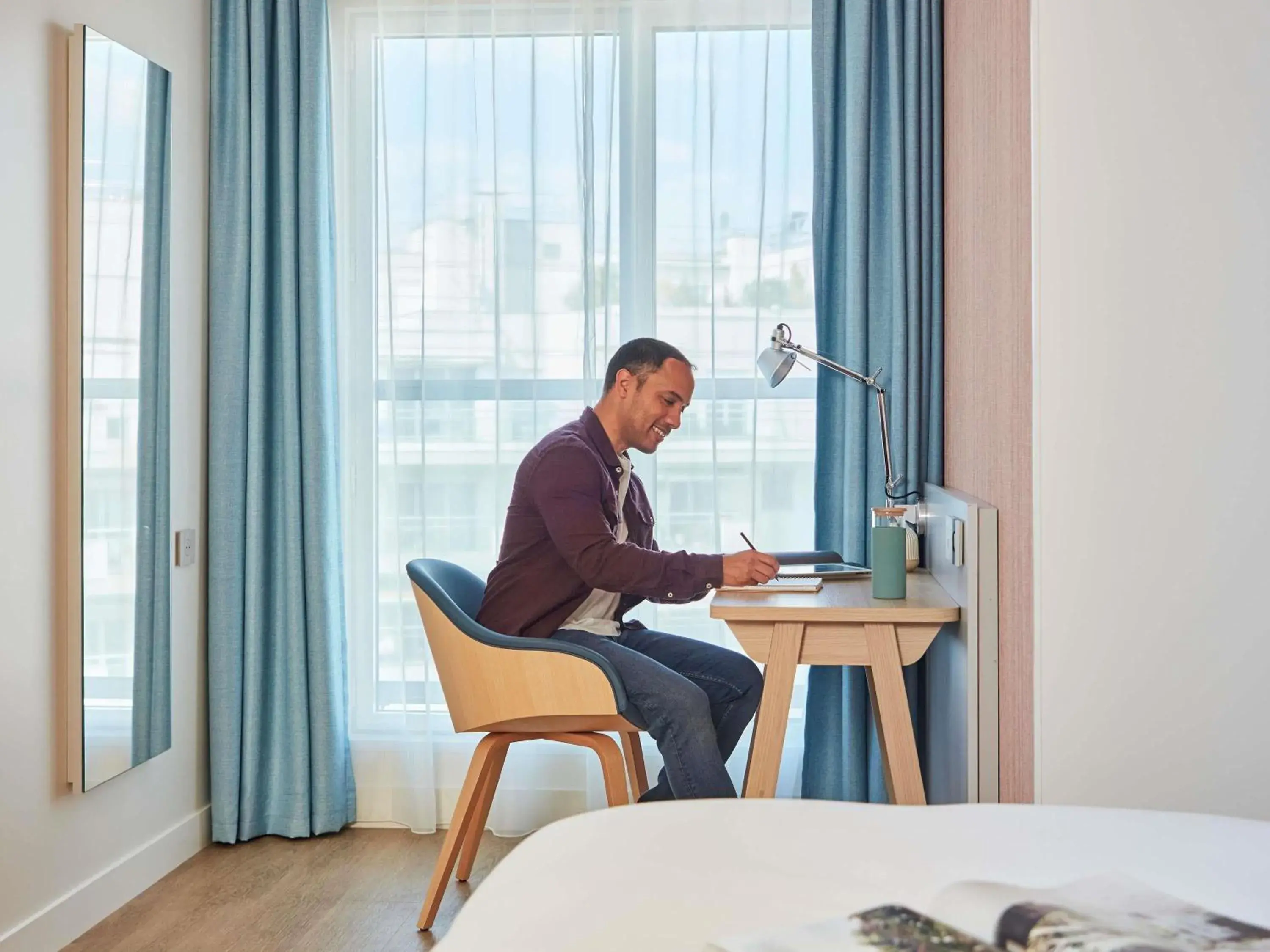 Bedroom in Aparthotel Adagio Paris Boulogne Bedroom in Aparthotel Adagio Paris Boulogne