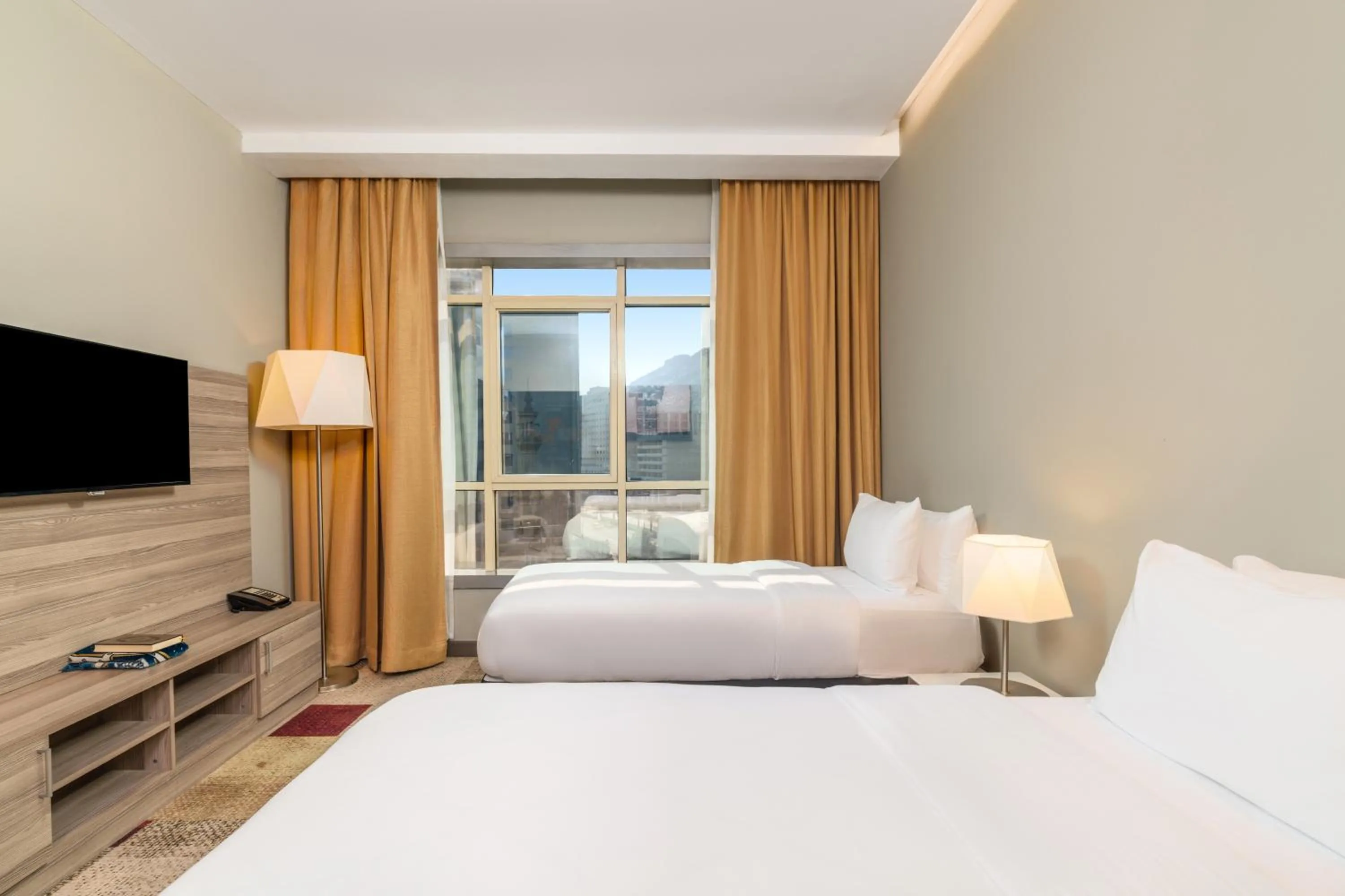 Bed in Mercure Makkah Aziziah