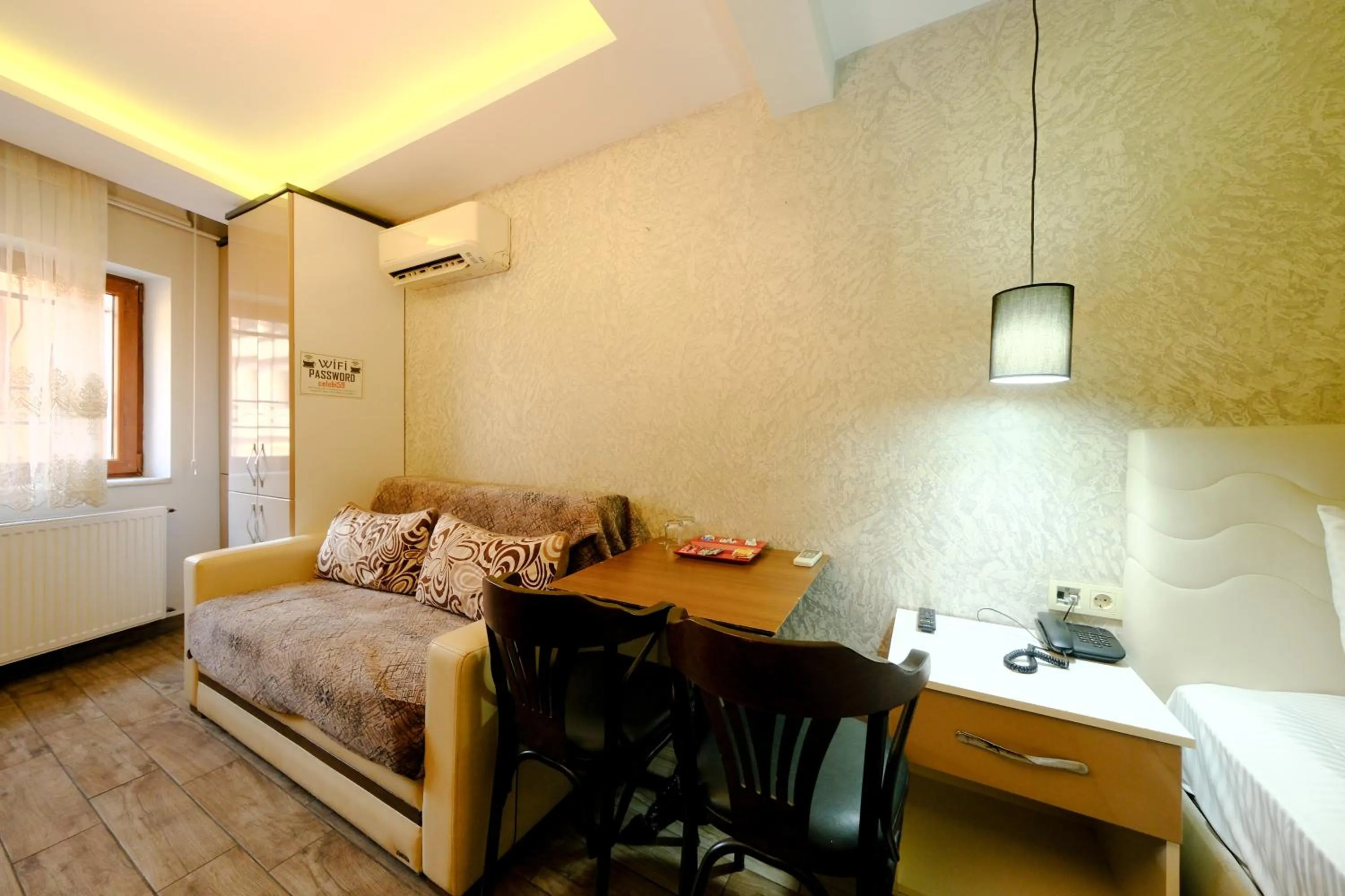 Living room, Bed in Taksim Celebi Suites