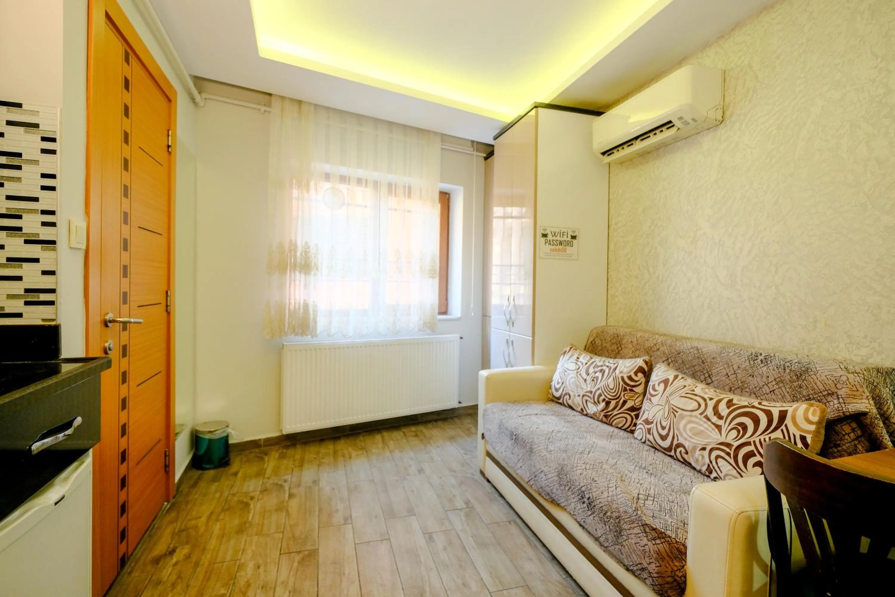 Living room, Bed in Taksim Celebi Suites
