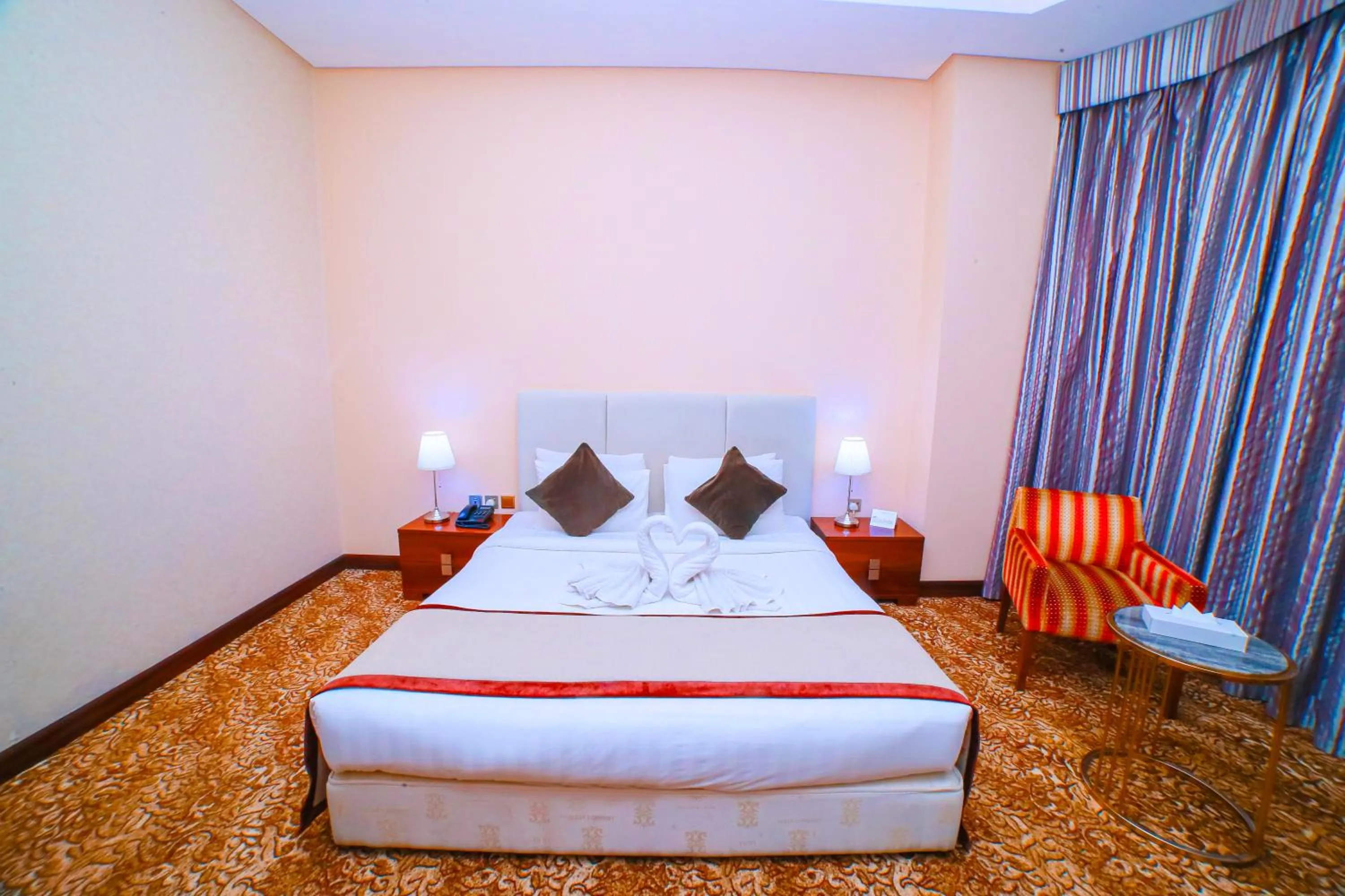 Bed in GREEN GARDEN HOTEL