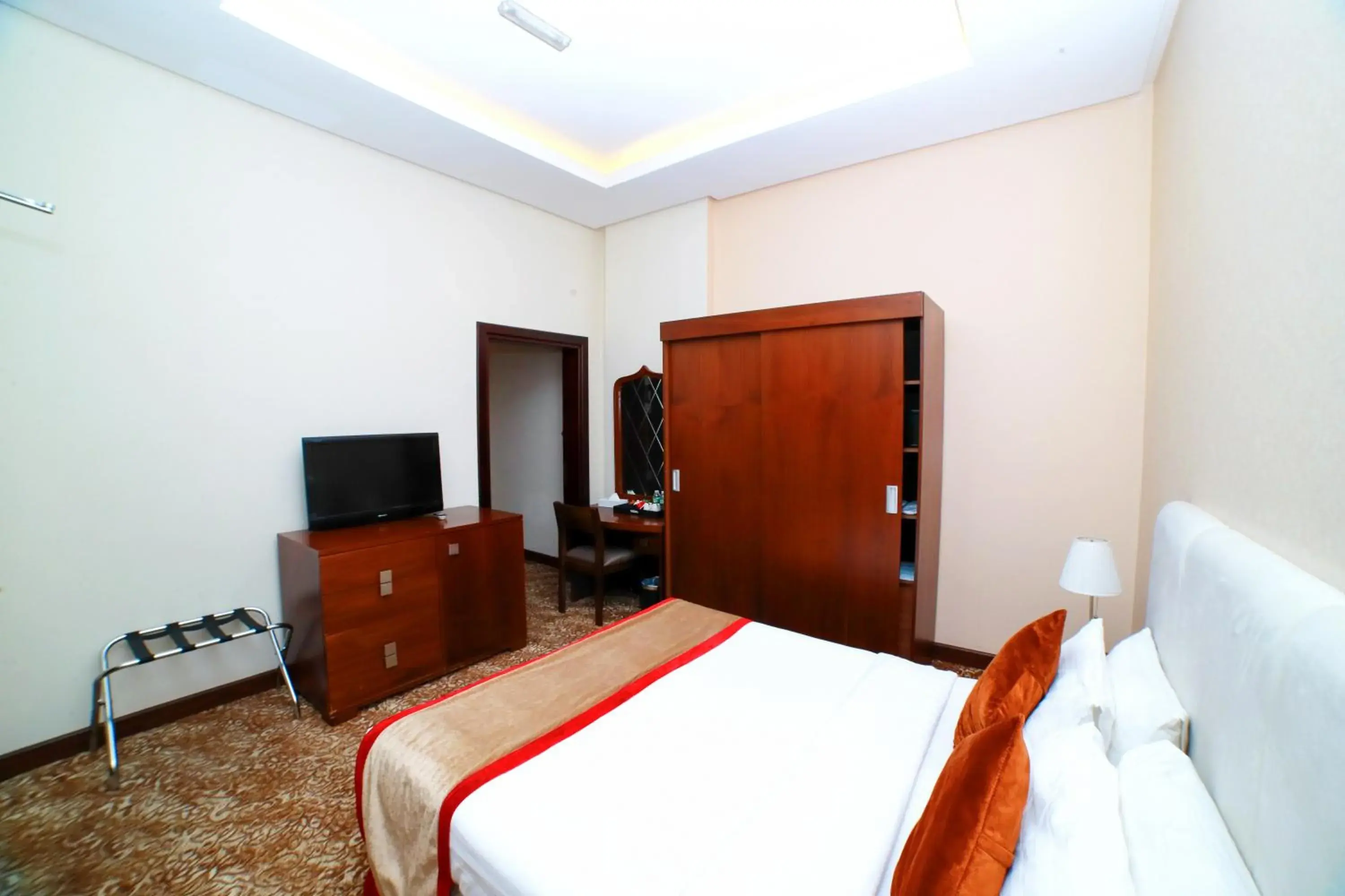 Bed in GREEN GARDEN HOTEL Bed in GREEN GARDEN HOTEL