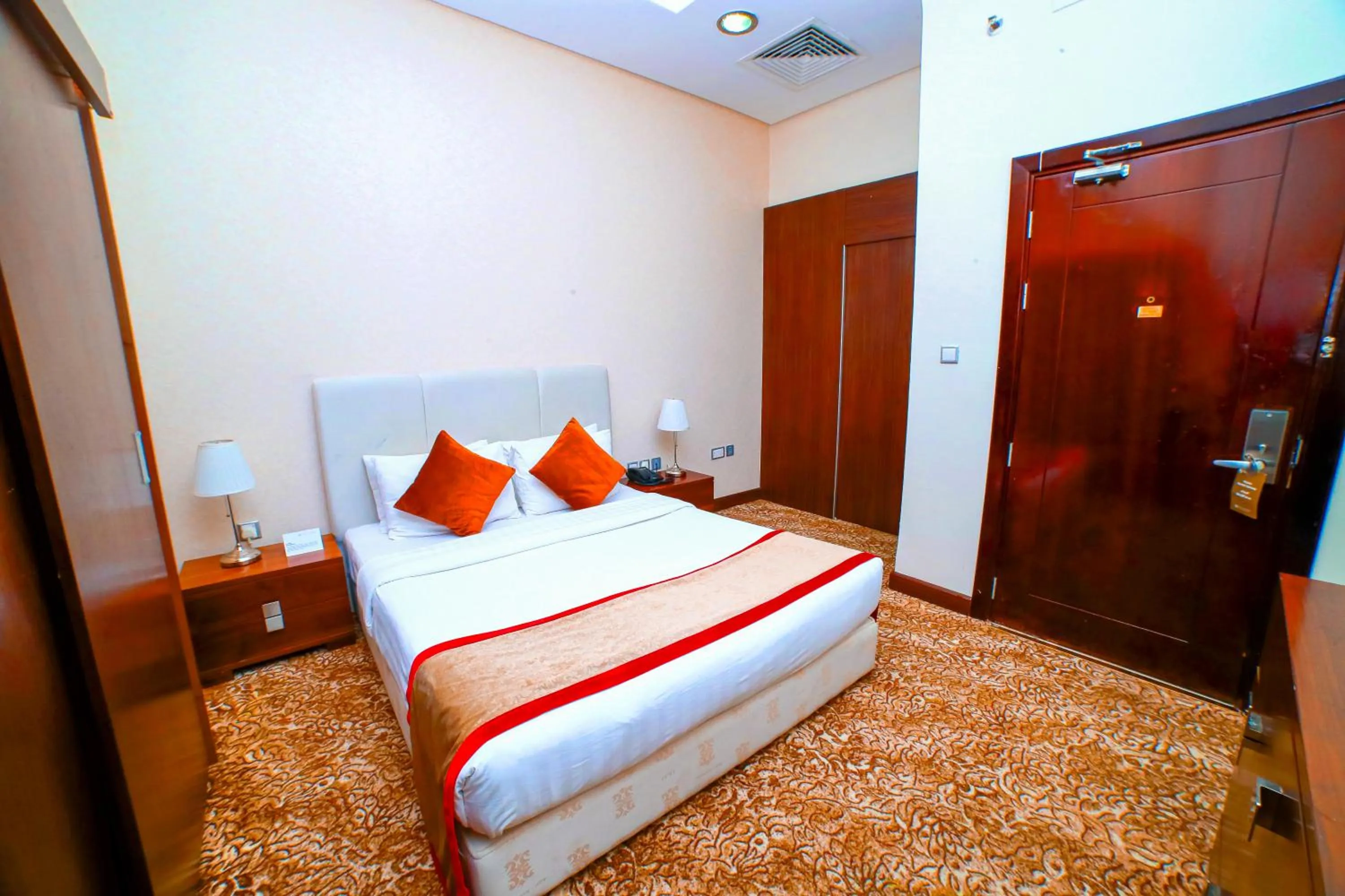 Bed in GREEN GARDEN HOTEL