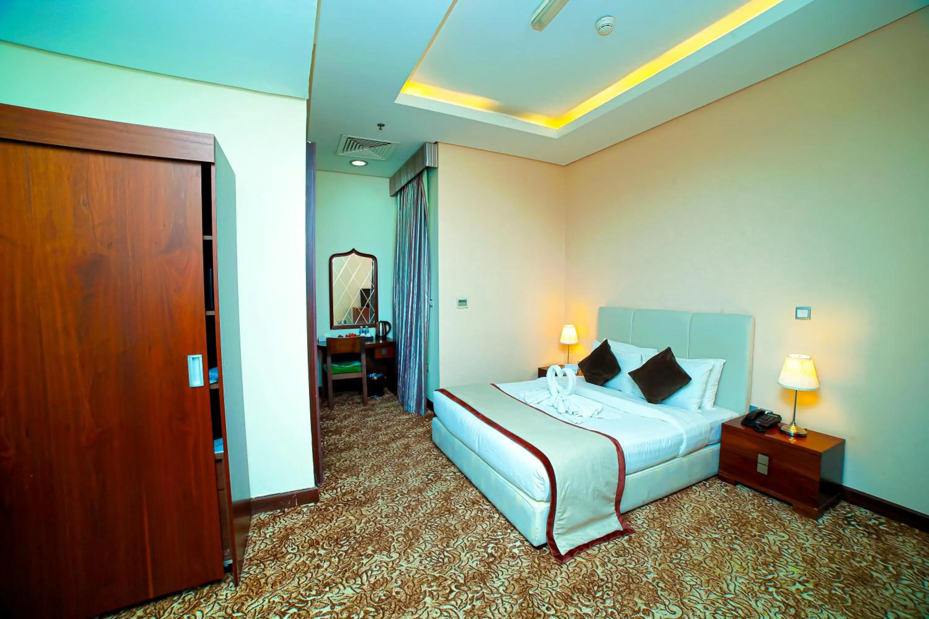 Bed in GREEN GARDEN HOTEL