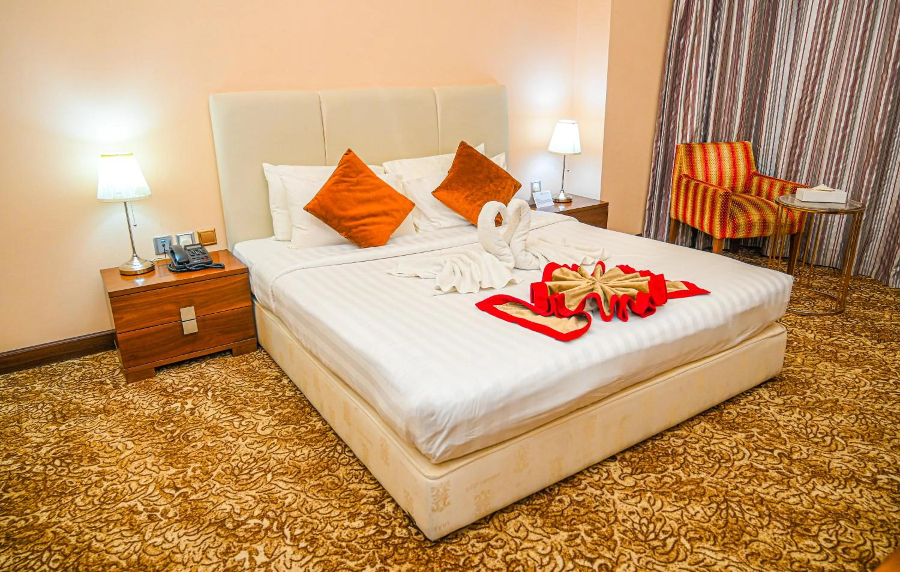 Bed in GREEN GARDEN HOTEL