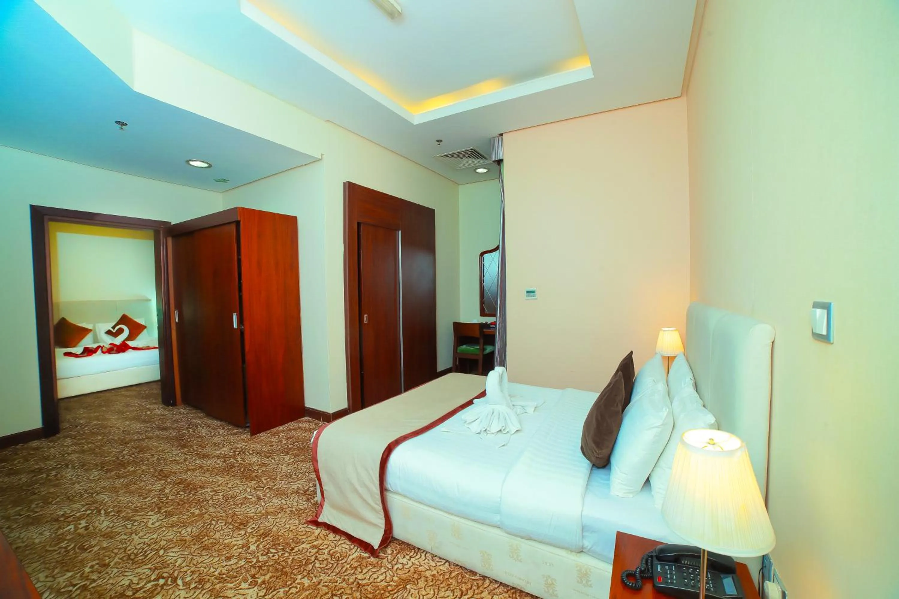 Bed in GREEN GARDEN HOTEL