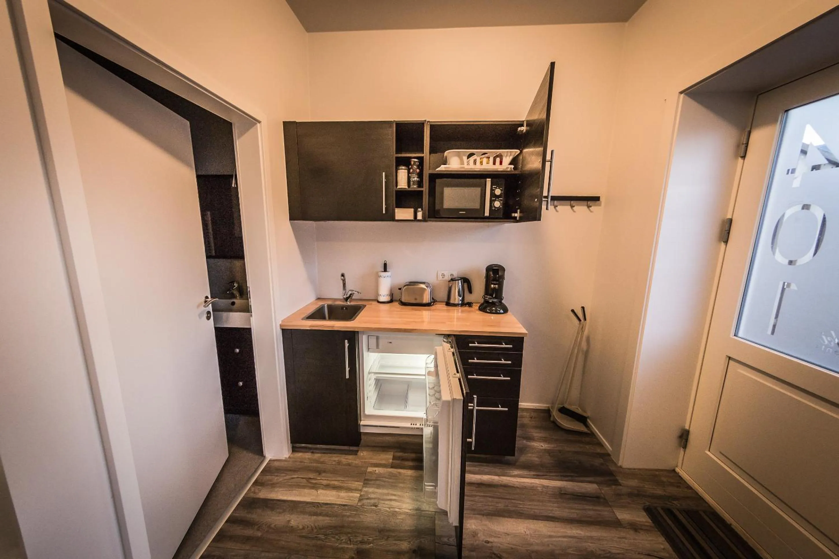 Kitchen or kitchenette in Bakki Apartments & Hostel