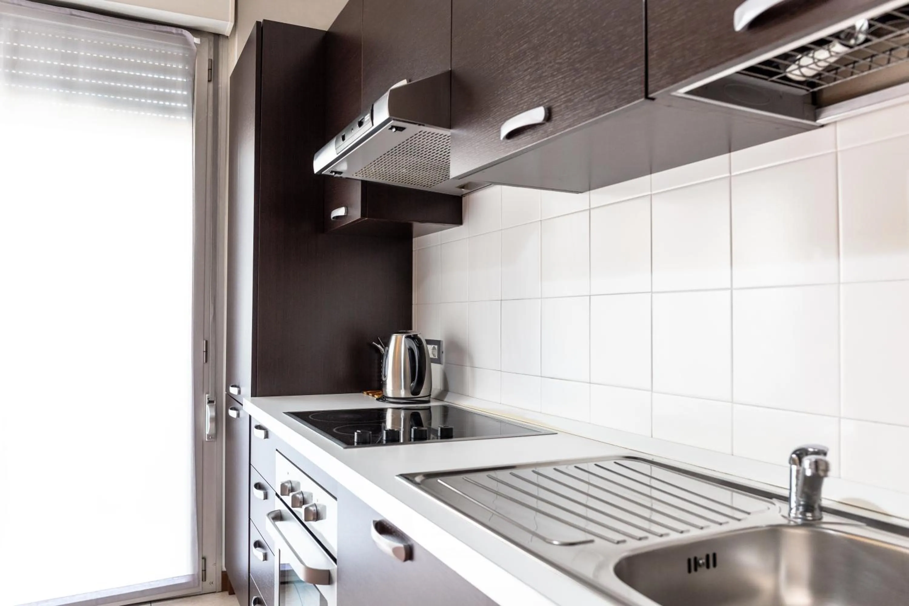 Kitchen or kitchenette in Housing32 Apartments