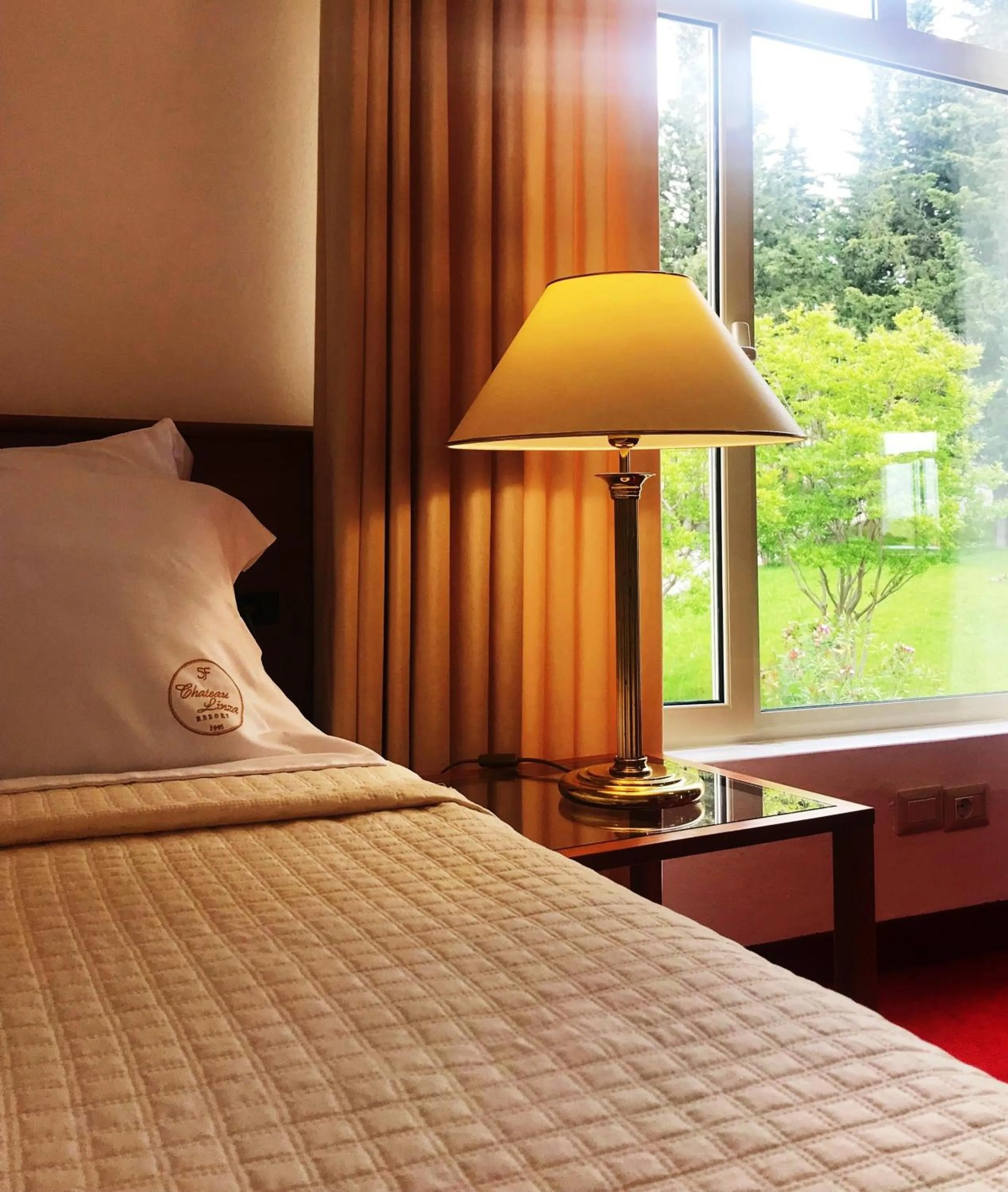 Bed in Chateau Linza Resort